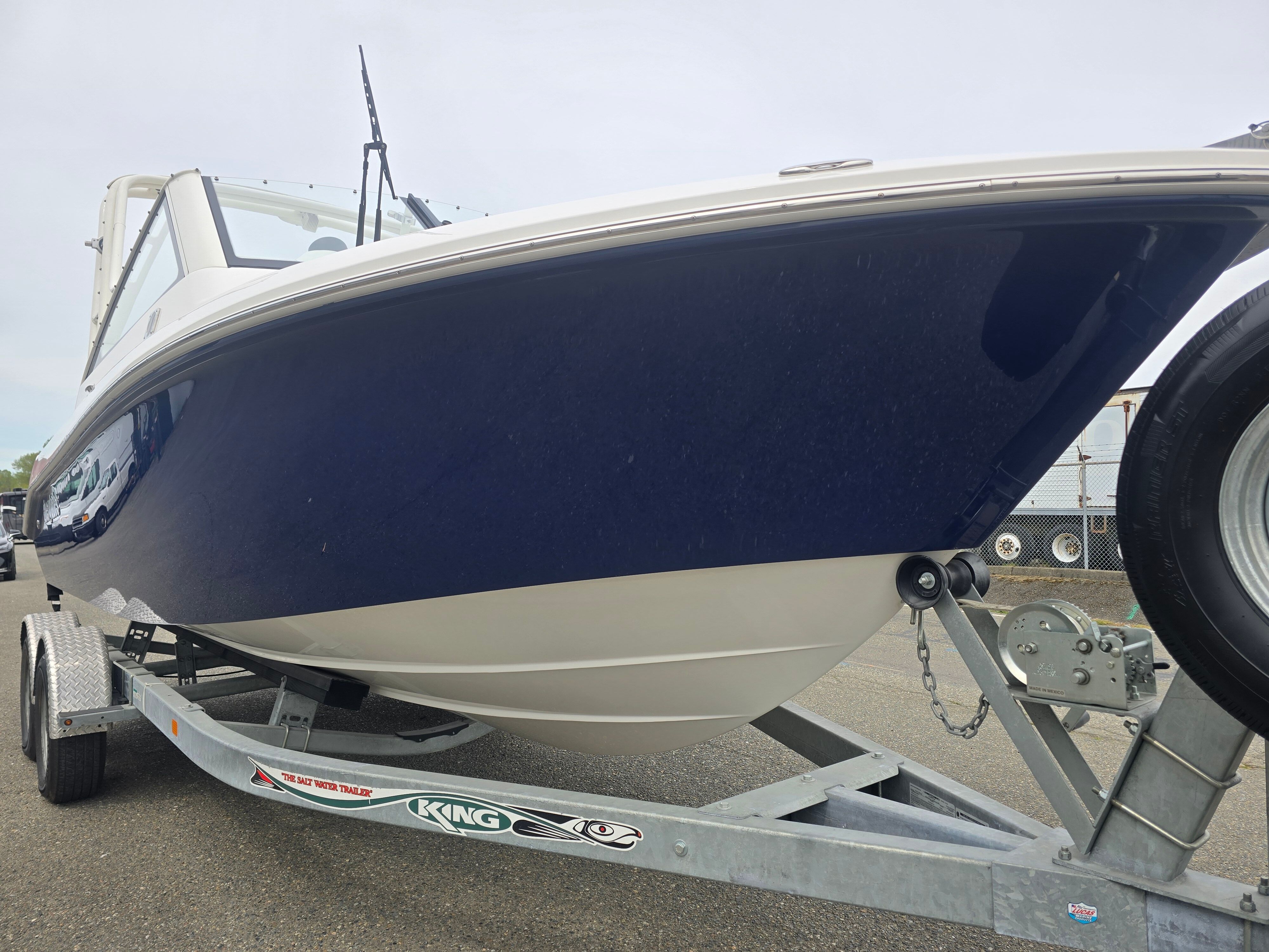 Everglades 230 Dual Console boat on a trailer.