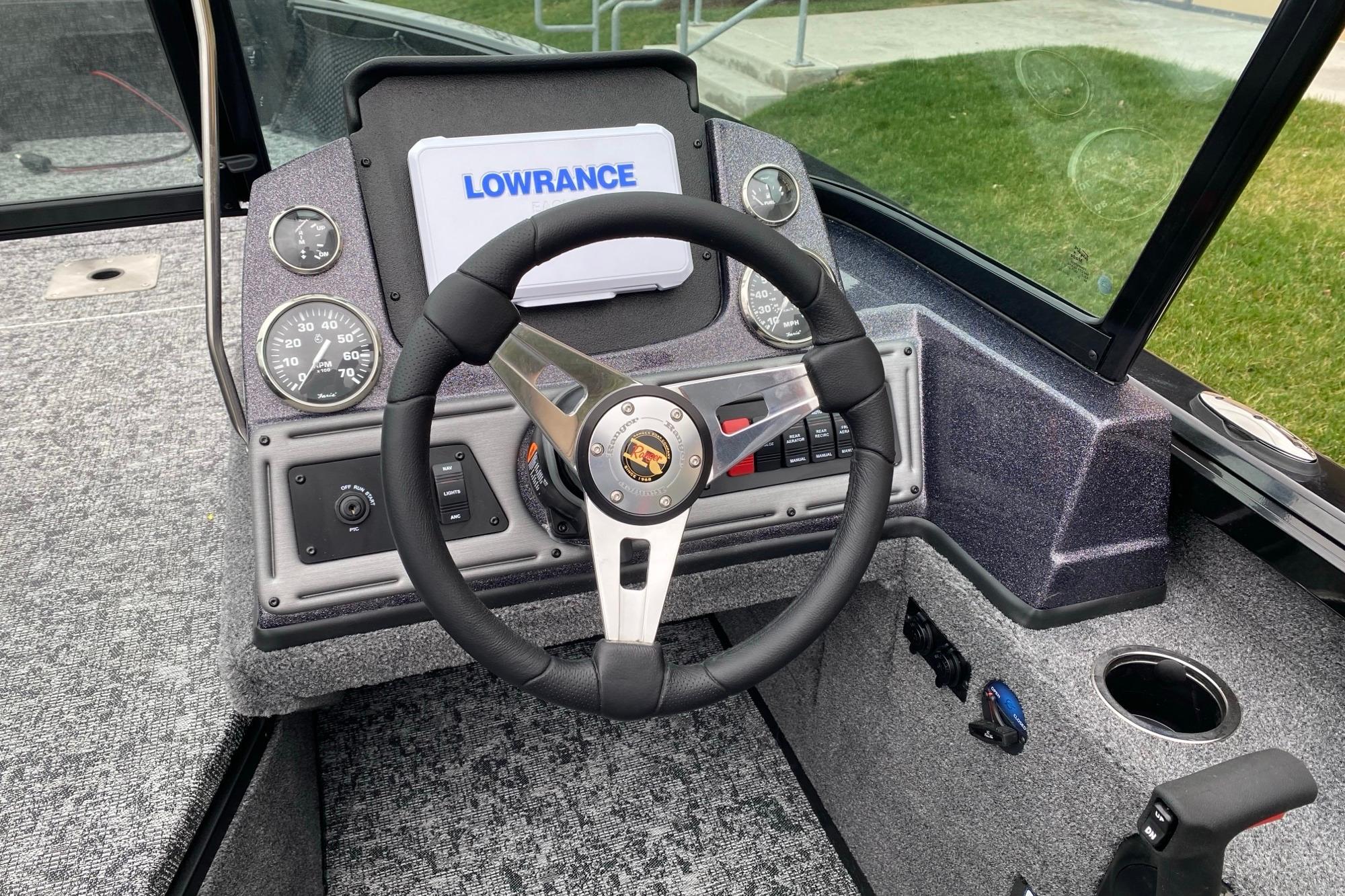 2026 Ranger VS1882SC Angler boat dashboard with steering wheel and Lowrance display.