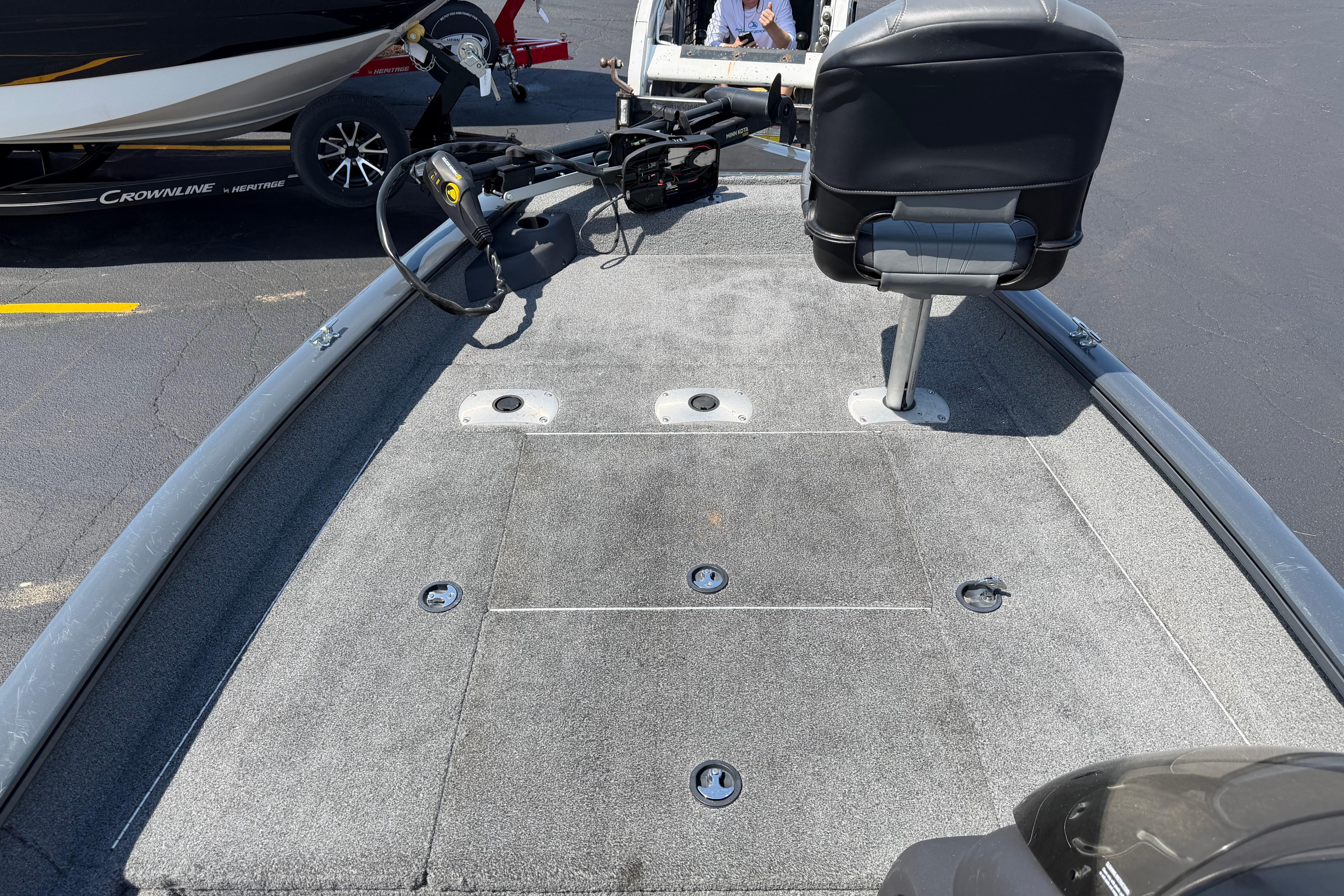 2019 Tracker Pro Team 175 TF boat deck with seating and trolling motor.