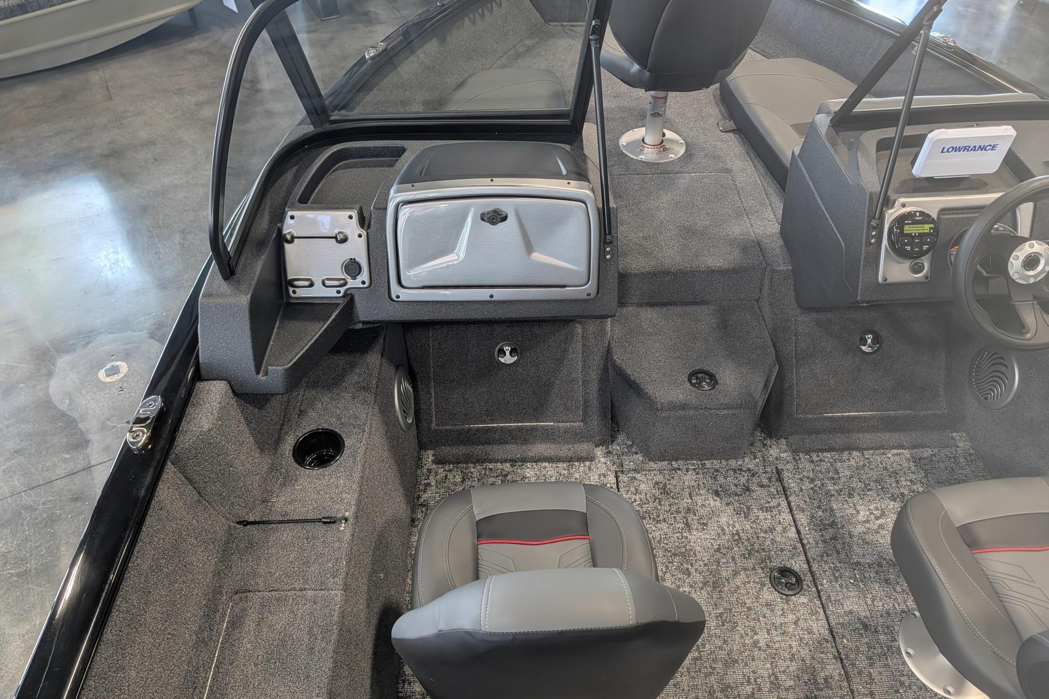 2026 Tracker Pro Guide V-175 Combo boat interior with seating and dashboard.