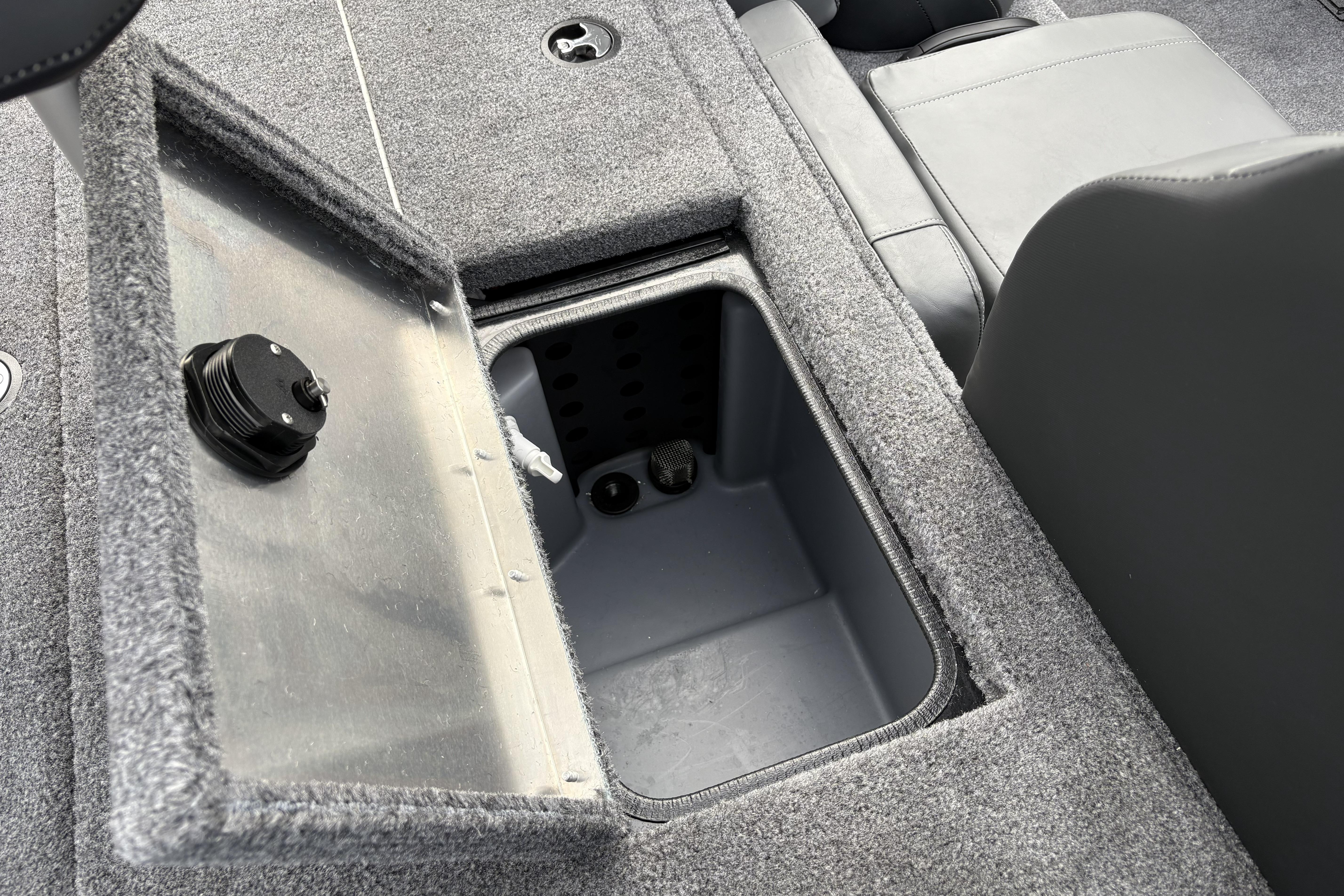 Open storage compartment in 2026 Tracker Pro Team 195 boat interior.