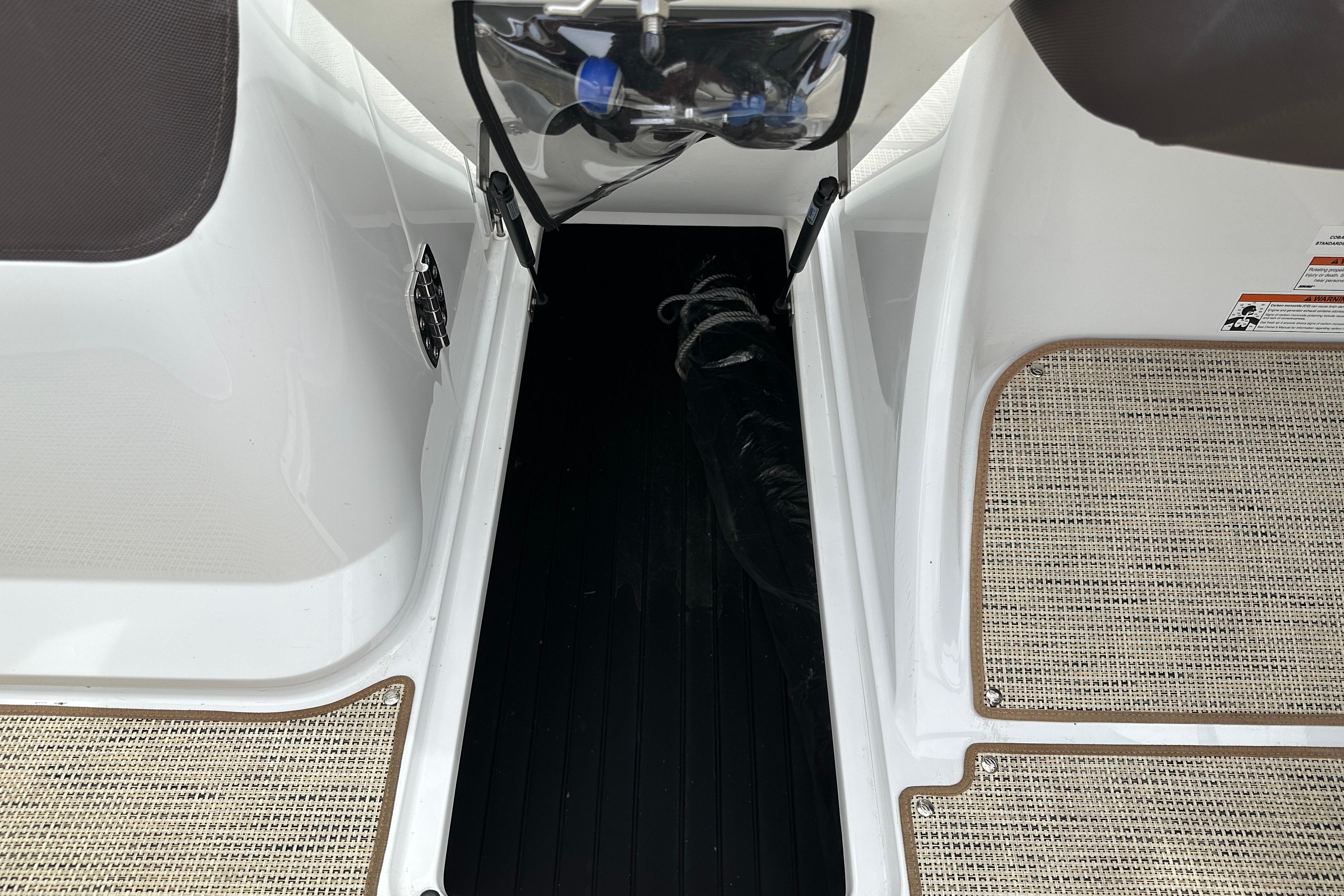 2019 Cobalt R5 boat interior with textured flooring and sleek design elements.
