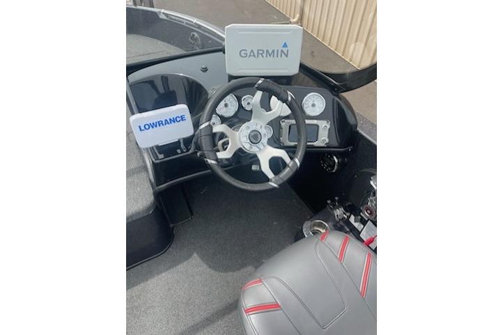 2023 Nitro ZV19 Sport boat dashboard with Garmin and Lowrance displays.