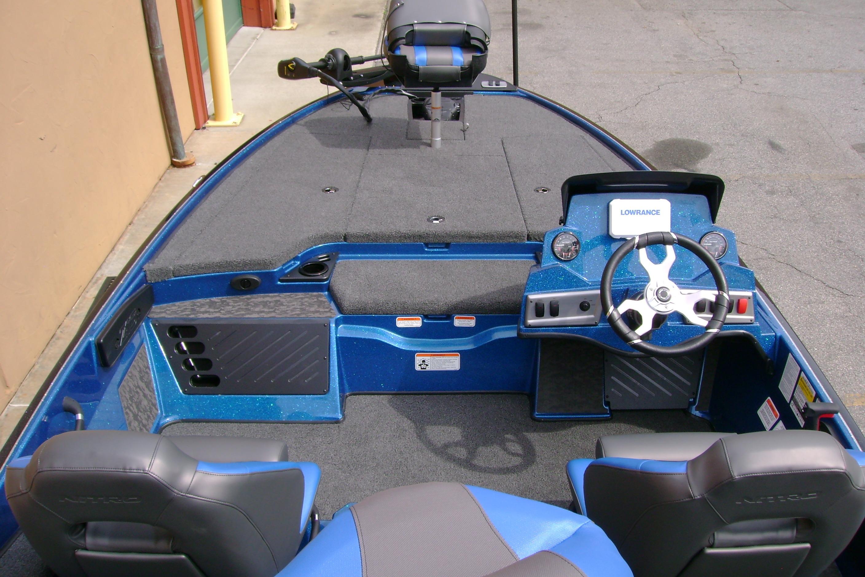 2026 Nitro Z19 XL boat interior with steering wheel and seating.