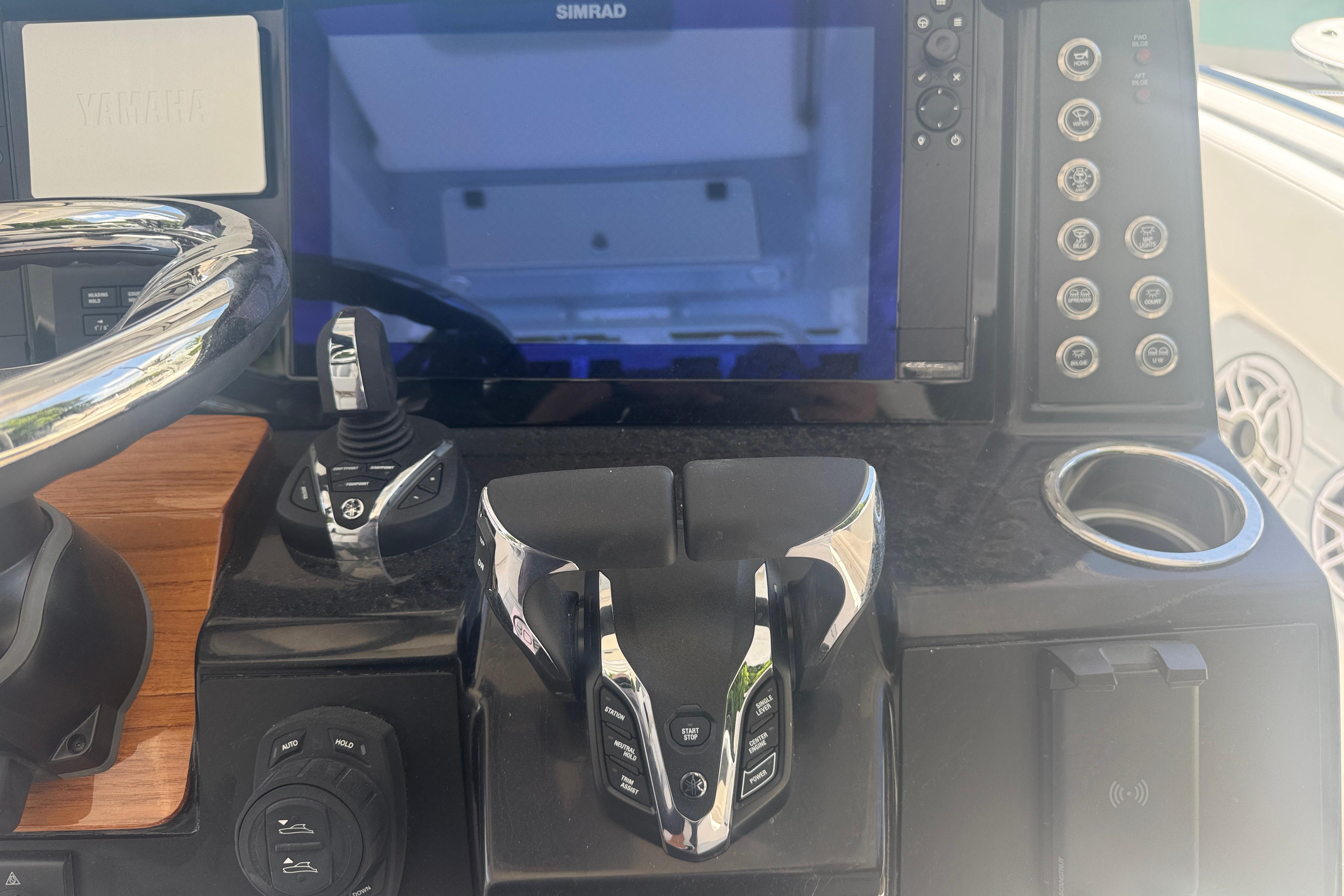2025 Robalo R300 Center Console dashboard with steering wheel and control panel.