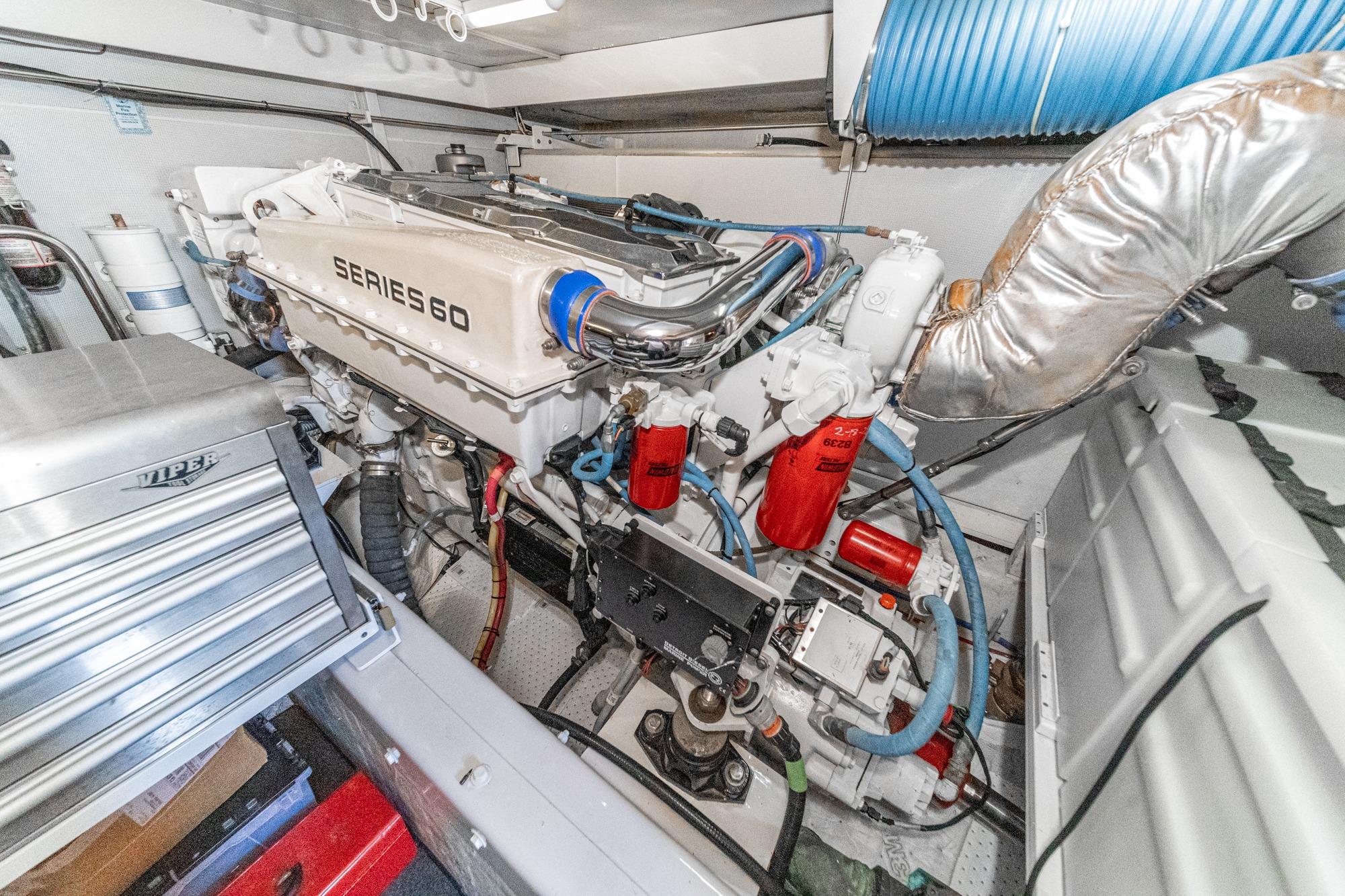 Engine room of a 2005 Marquis Pilothouse yacht featuring a Series 60 engine.