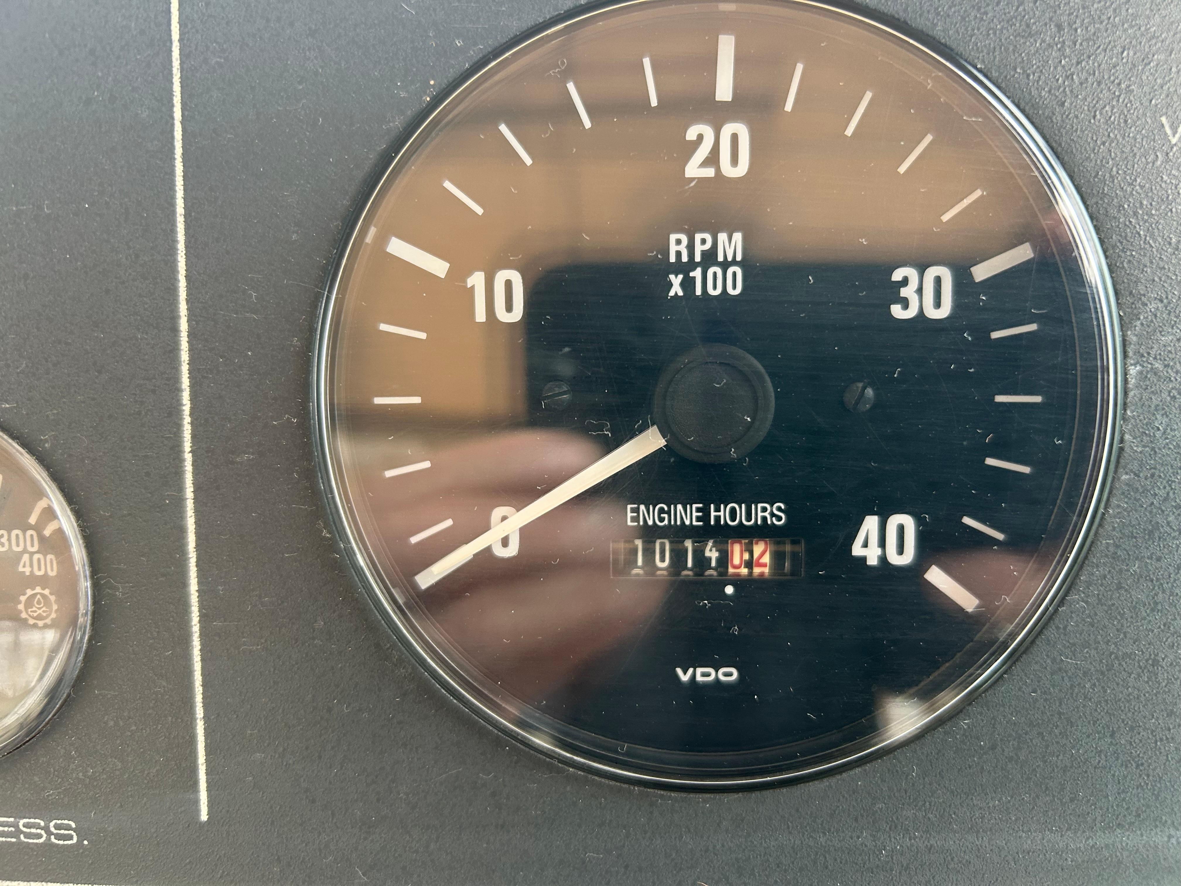 1997 Tiara Yachts 3500 Express tachometer showing RPM and engine hours.
