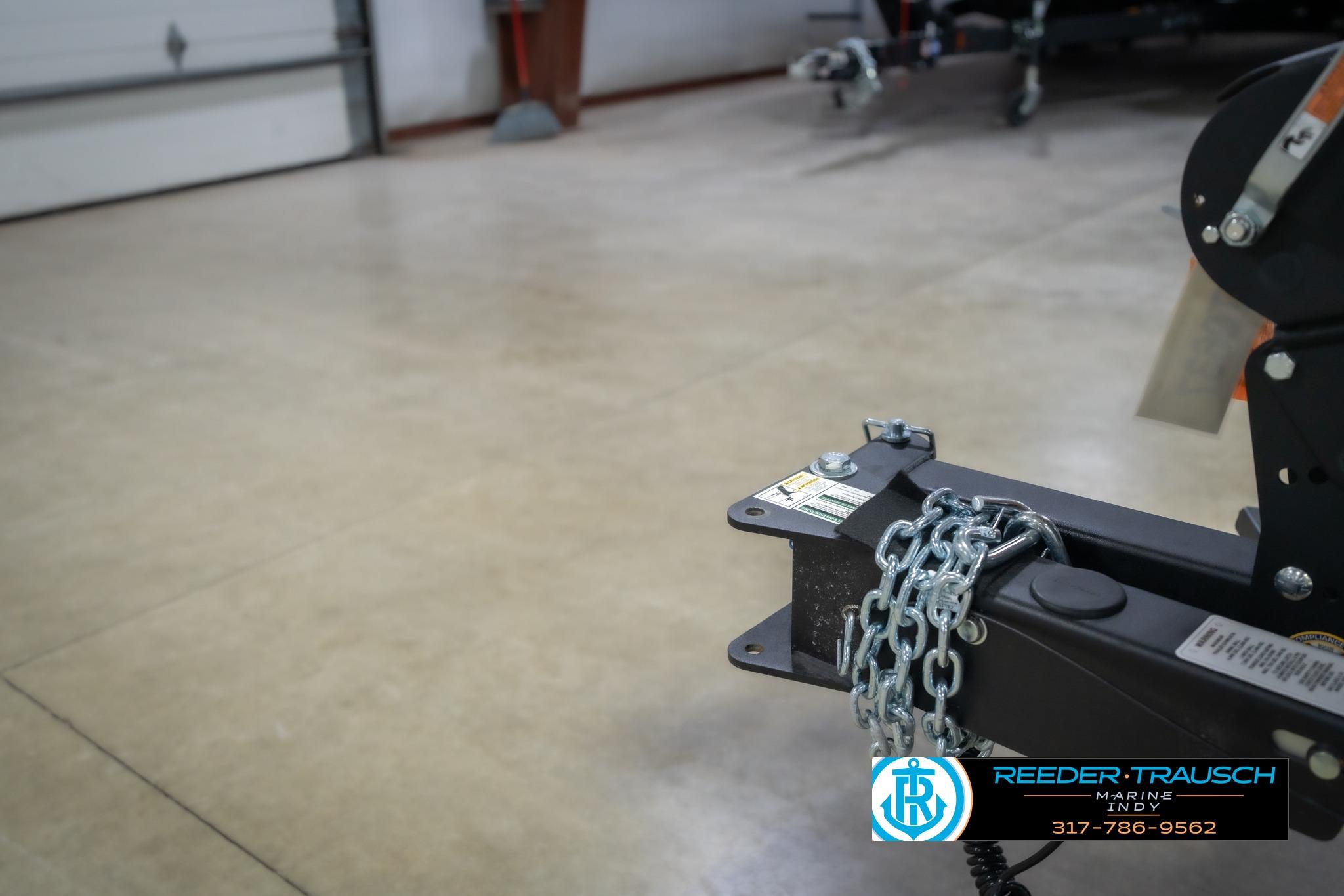 Trailer hitch of 2026 Lund 2075 Impact XS in a garage setting.