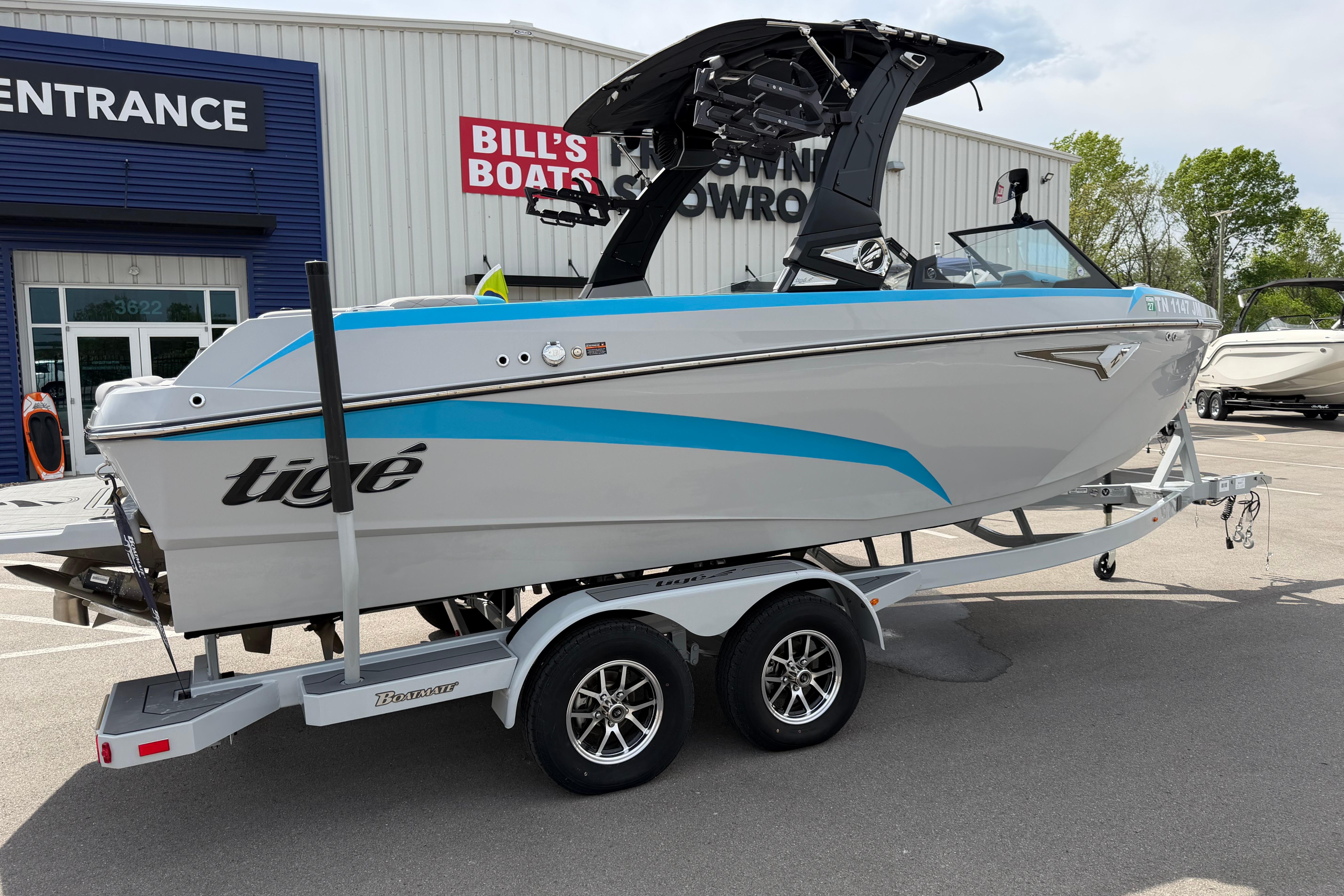 2024 Tigé Z1 boat on trailer outside Bill's Boats showroom.