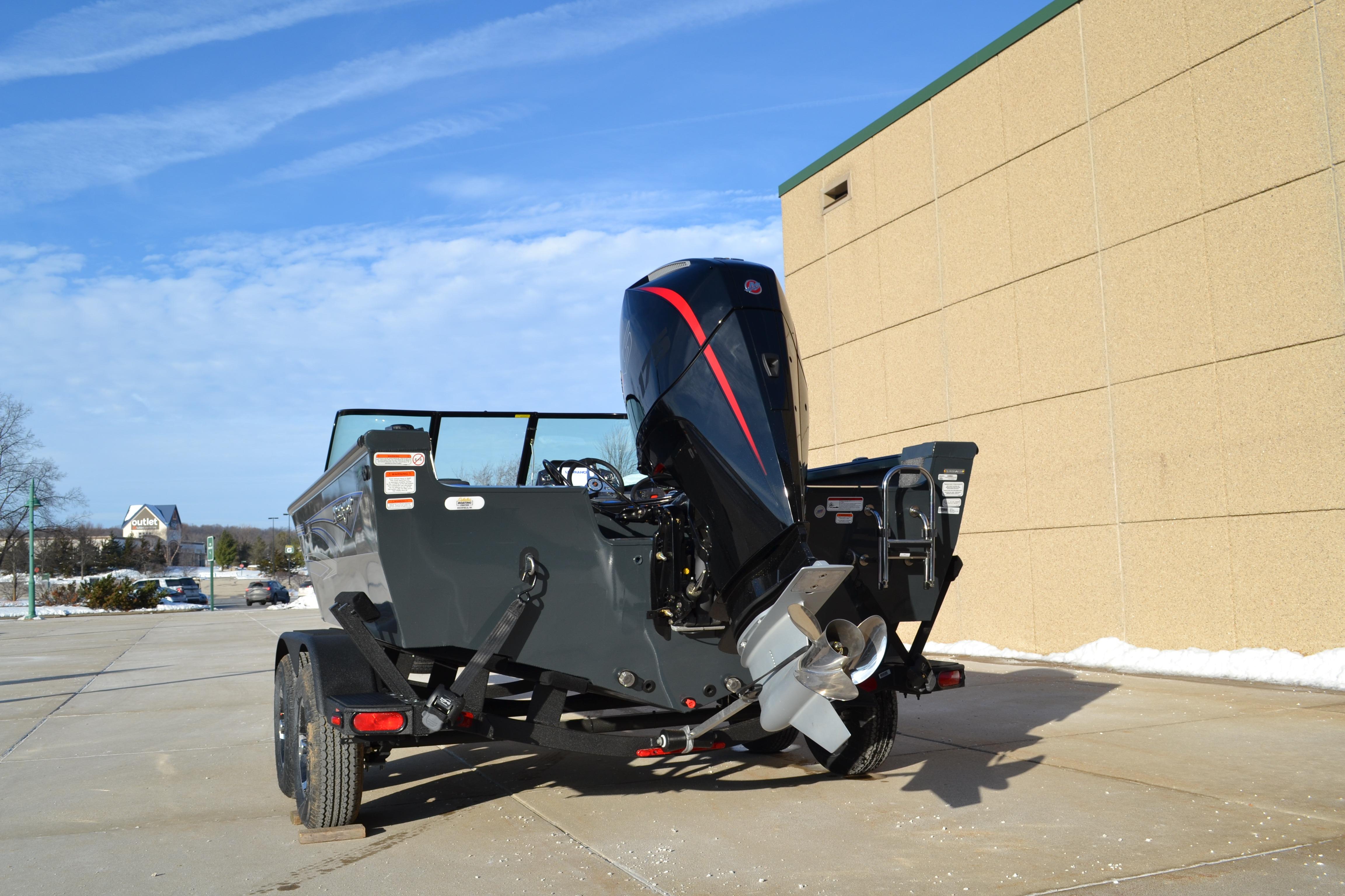 2026 Ranger VS1882SC Reata boat with powerful outboard motor on a trailer.