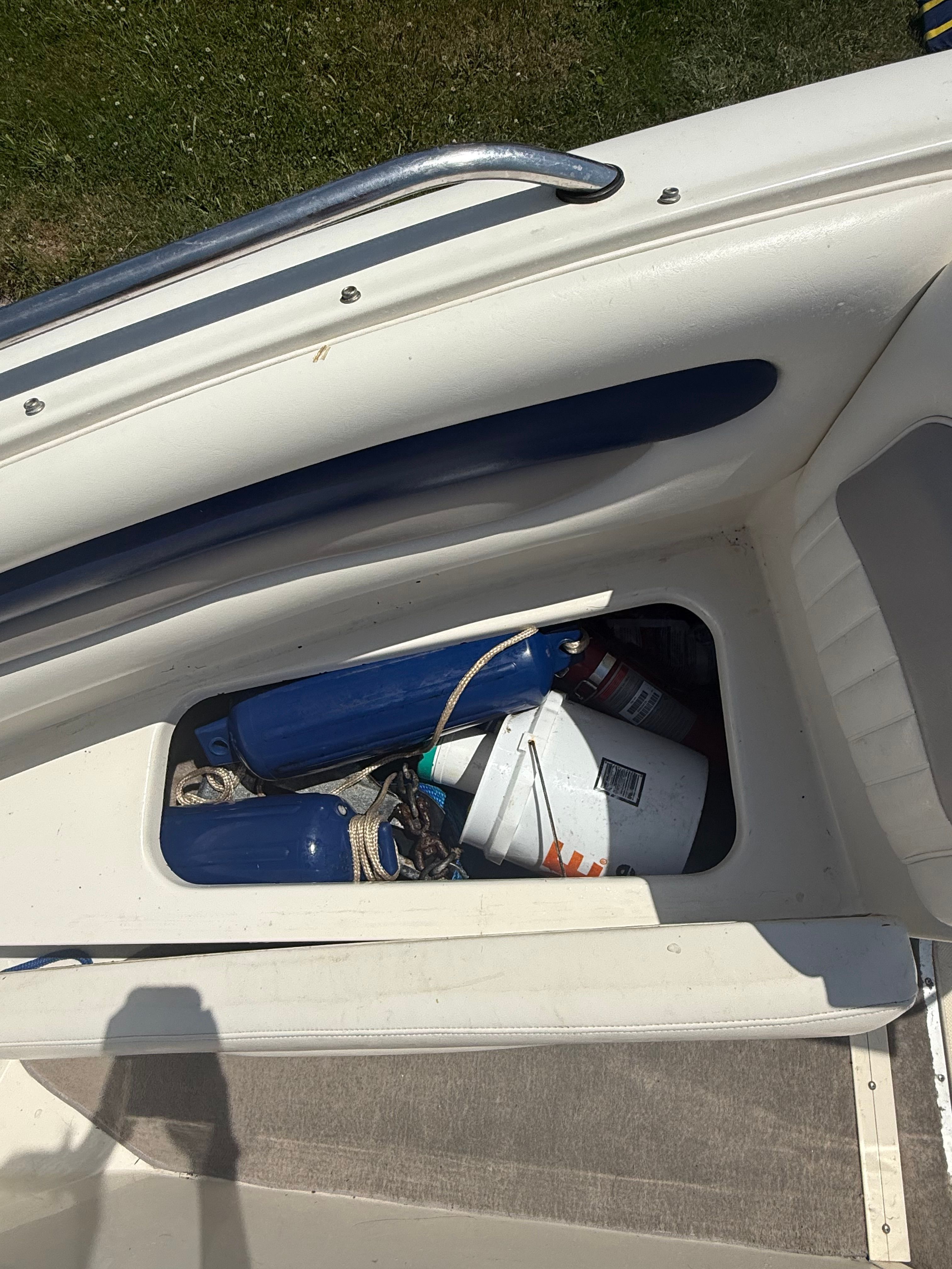 2003 Stingray 180 LS/LX with storage for fenders and a bucket.