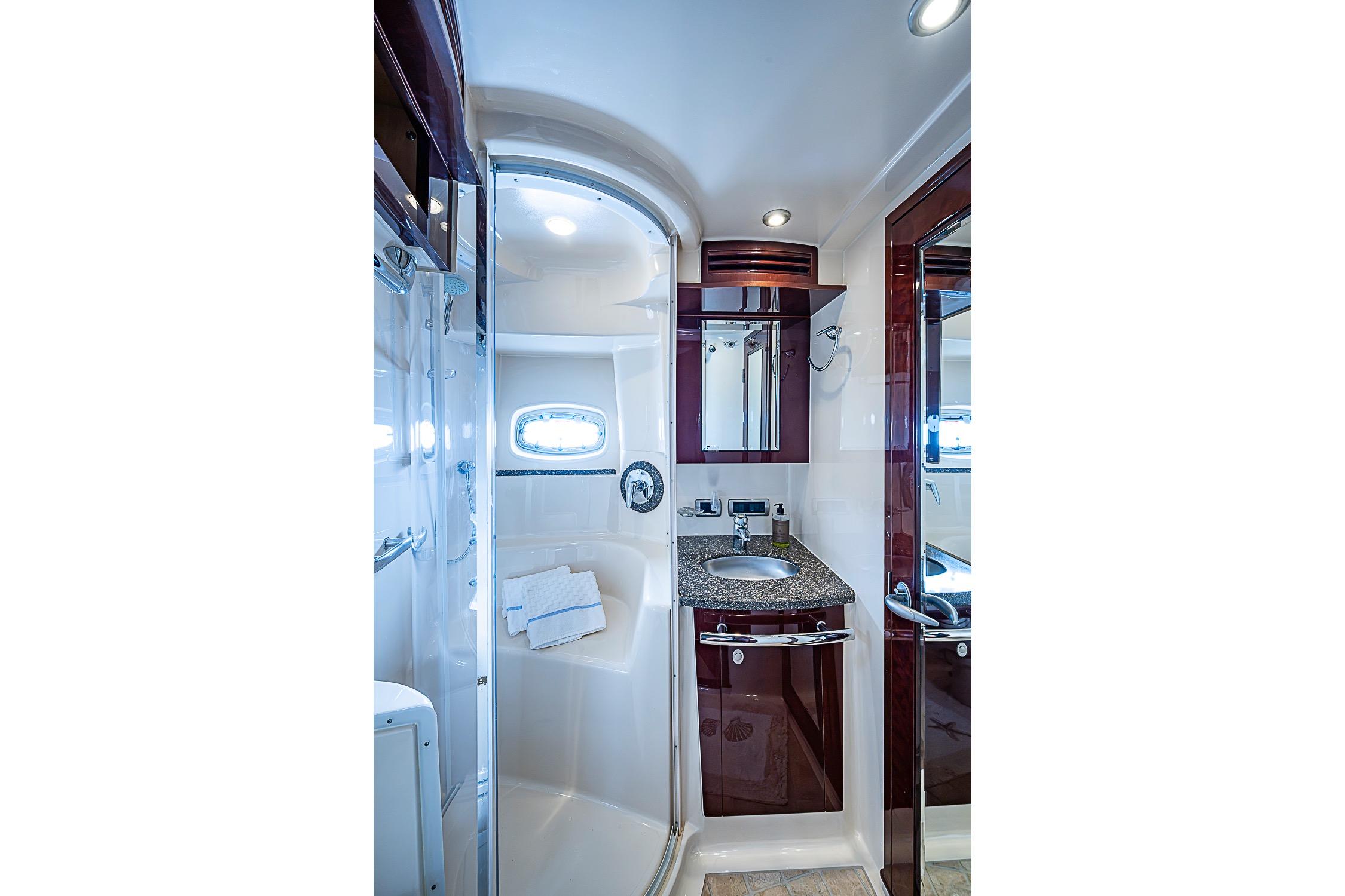 Luxurious bathroom in 2008 Sea Ray 60 Sundancer yacht with modern fixtures and elegant design.