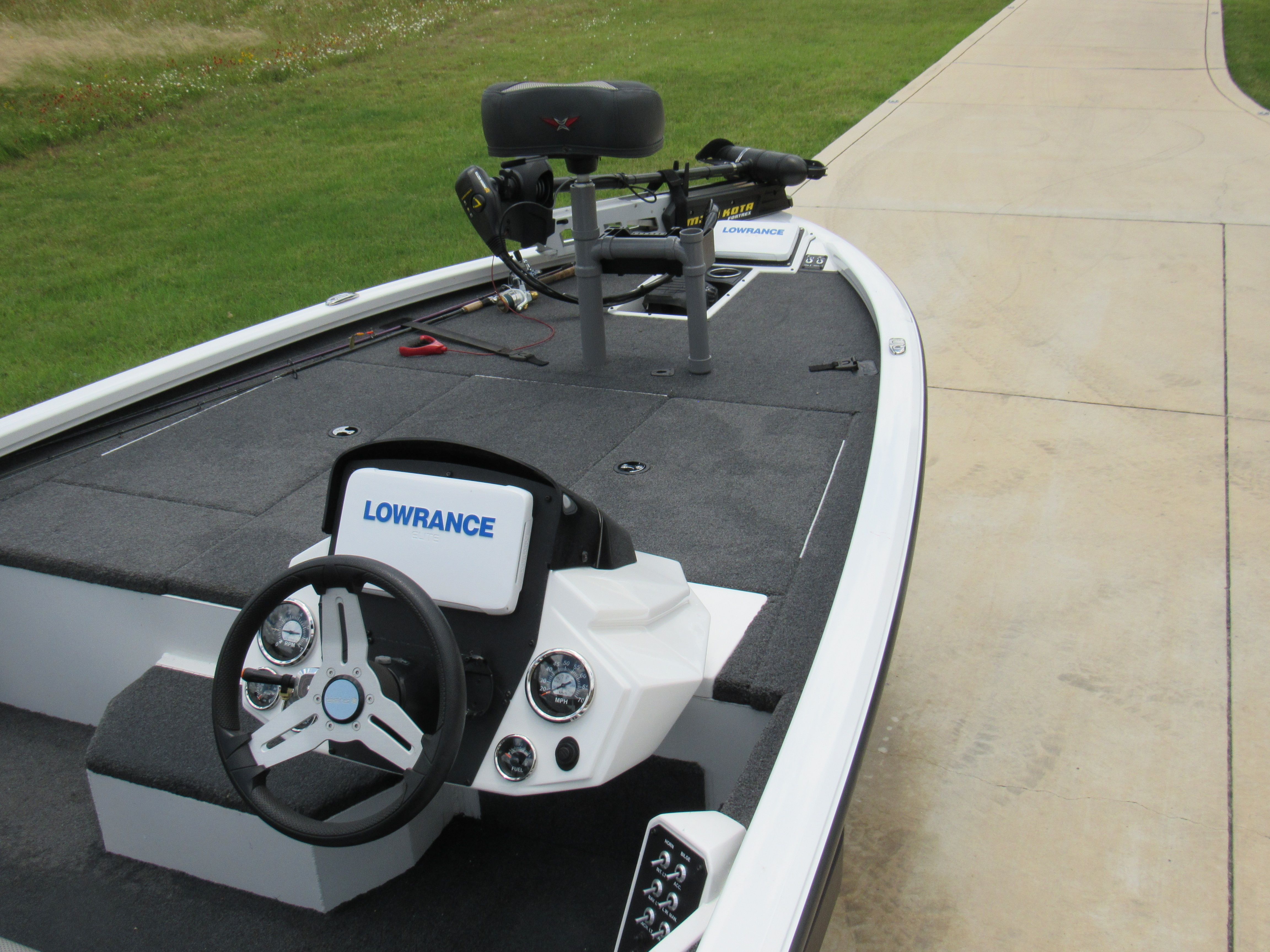A 2019 Vexus AVX 1880 boat with a modern helm and fishing equipment.