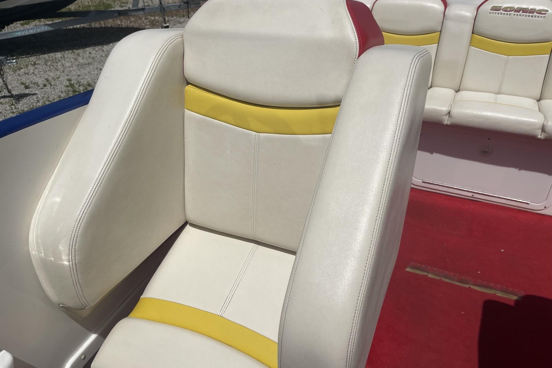 White and yellow boat seat in a 2006 Sonic 386 model.