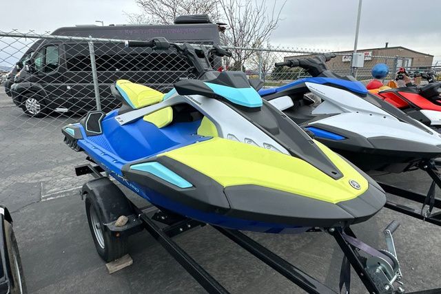 Yamaha WaveRunner JETBLASTER PRO 3 in blue and yellow on a trailer.
