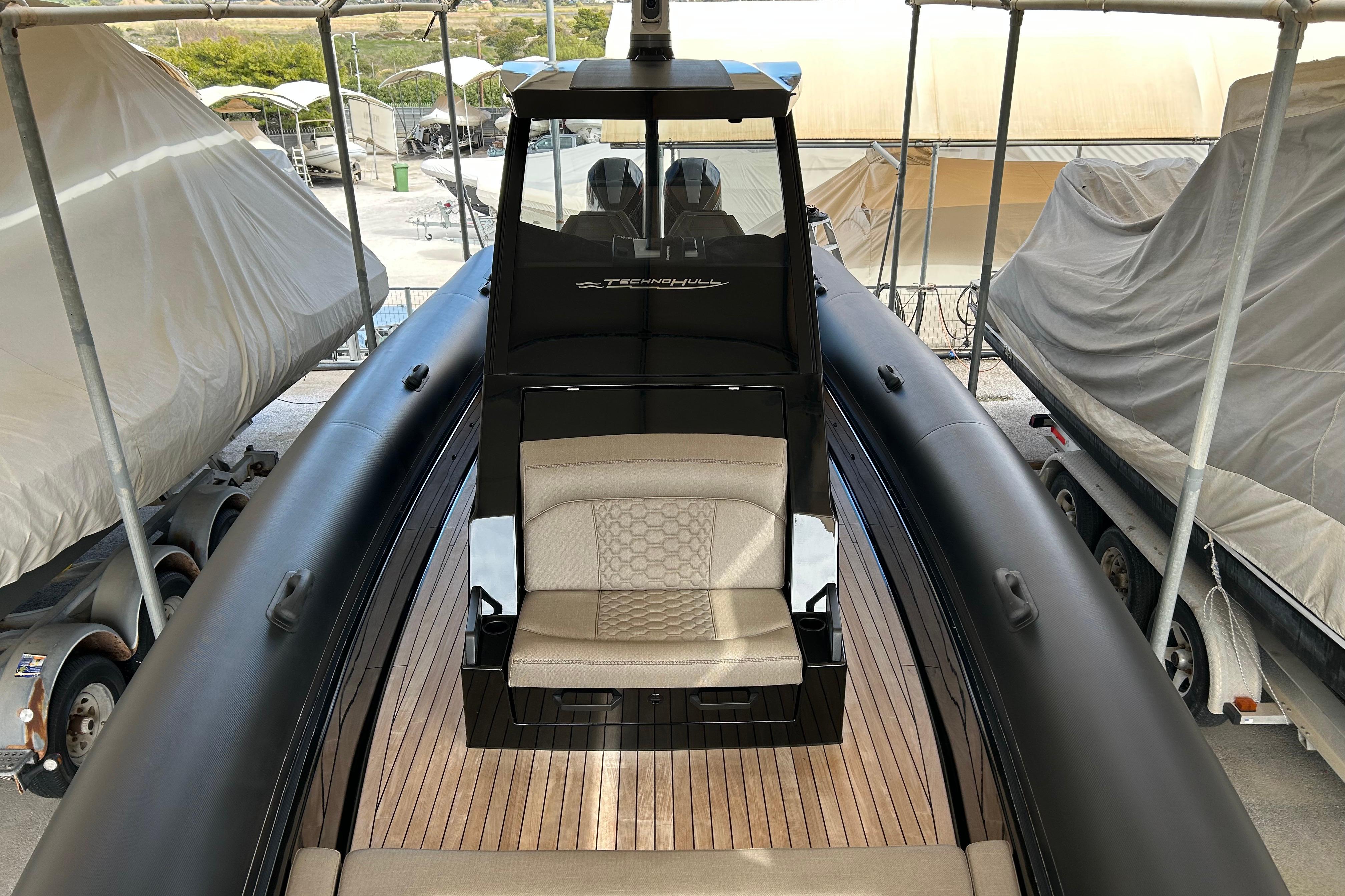 2022 Technohull 38 Grand Sport boat with sleek design and luxurious seating.