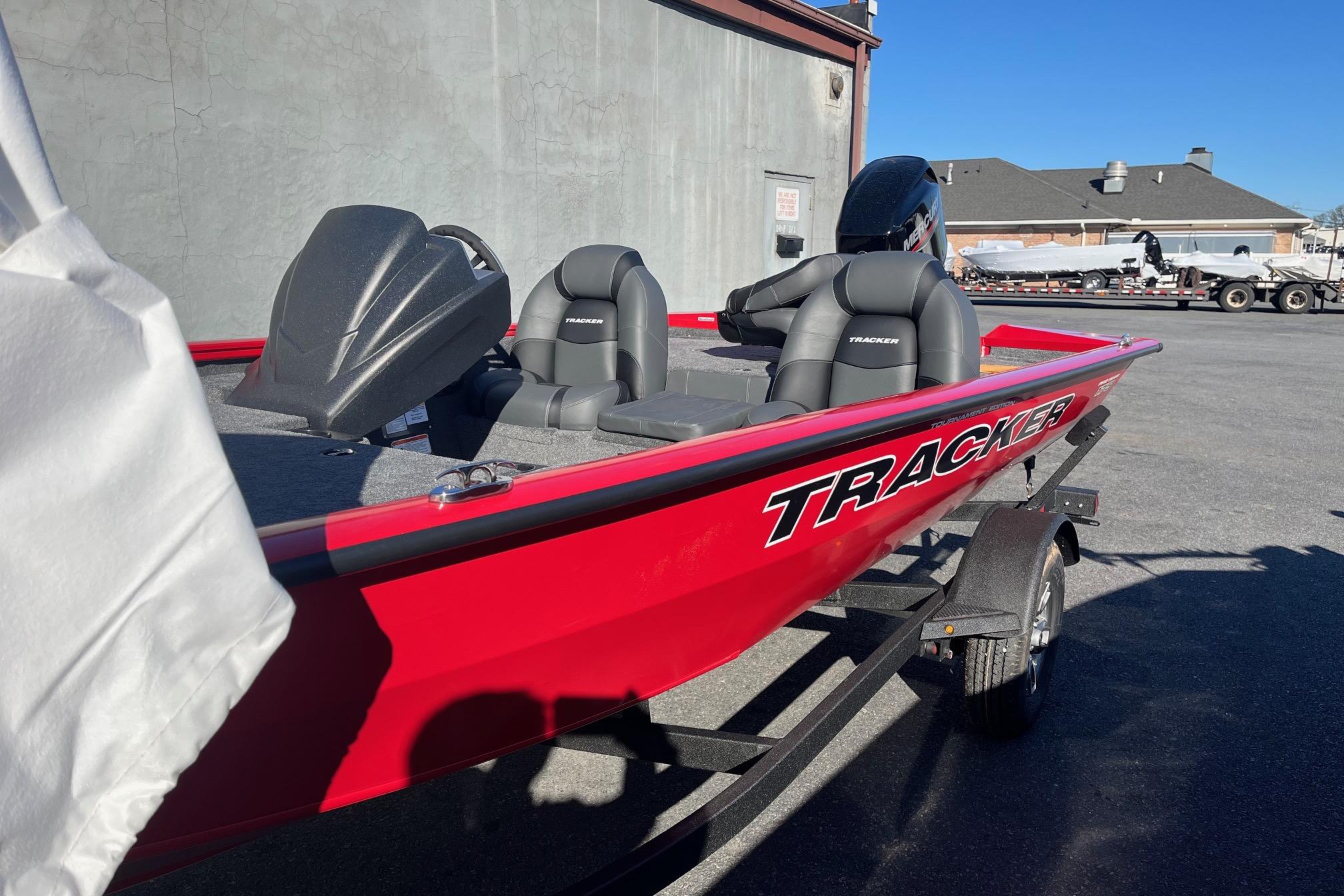 2026 Tracker Pro Team 175 boat, red exterior, parked outdoors on a trailer.