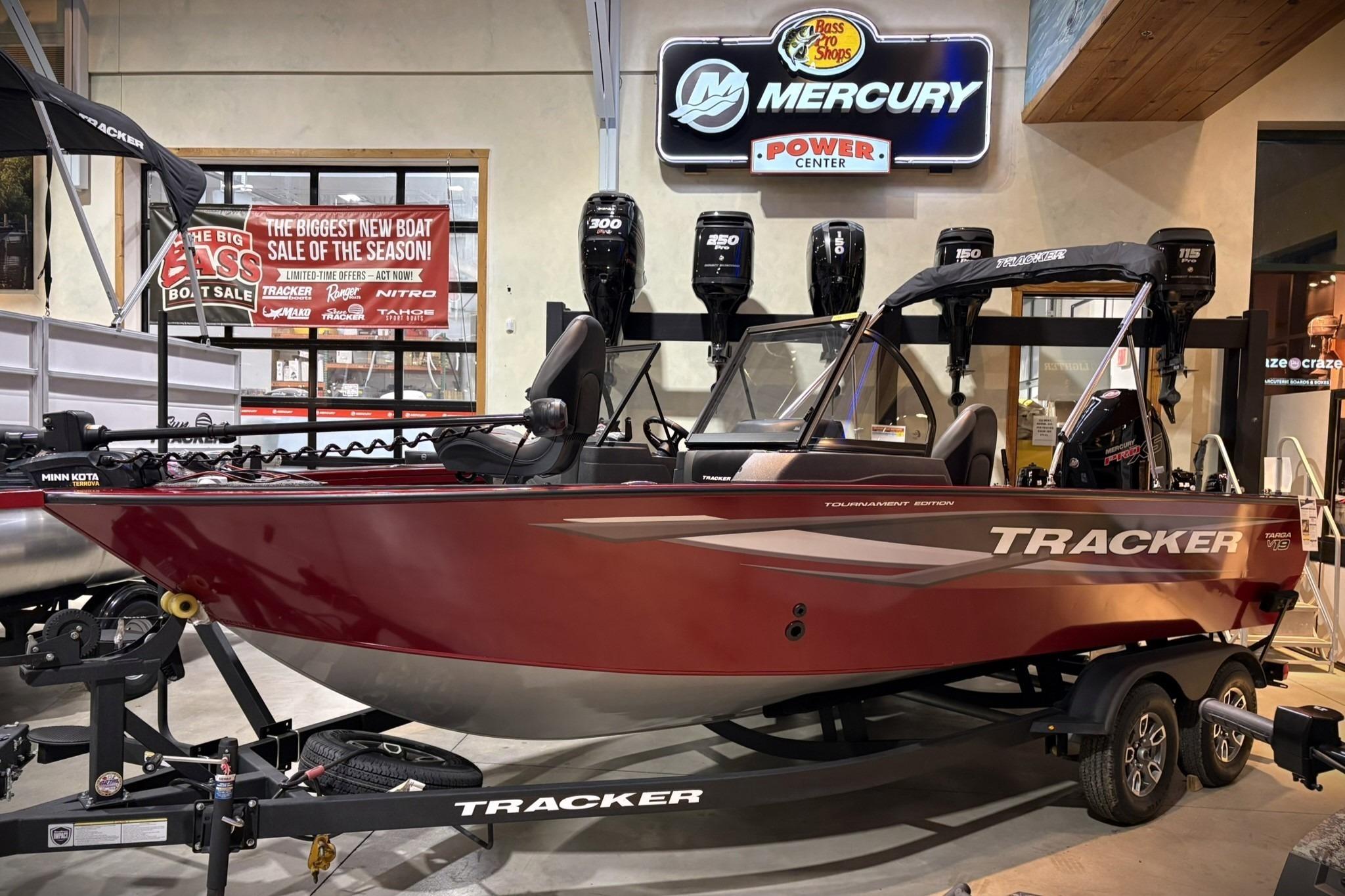 2025 Tracker Targa V-19 WT boat displayed at Mercury Power Center showroom.