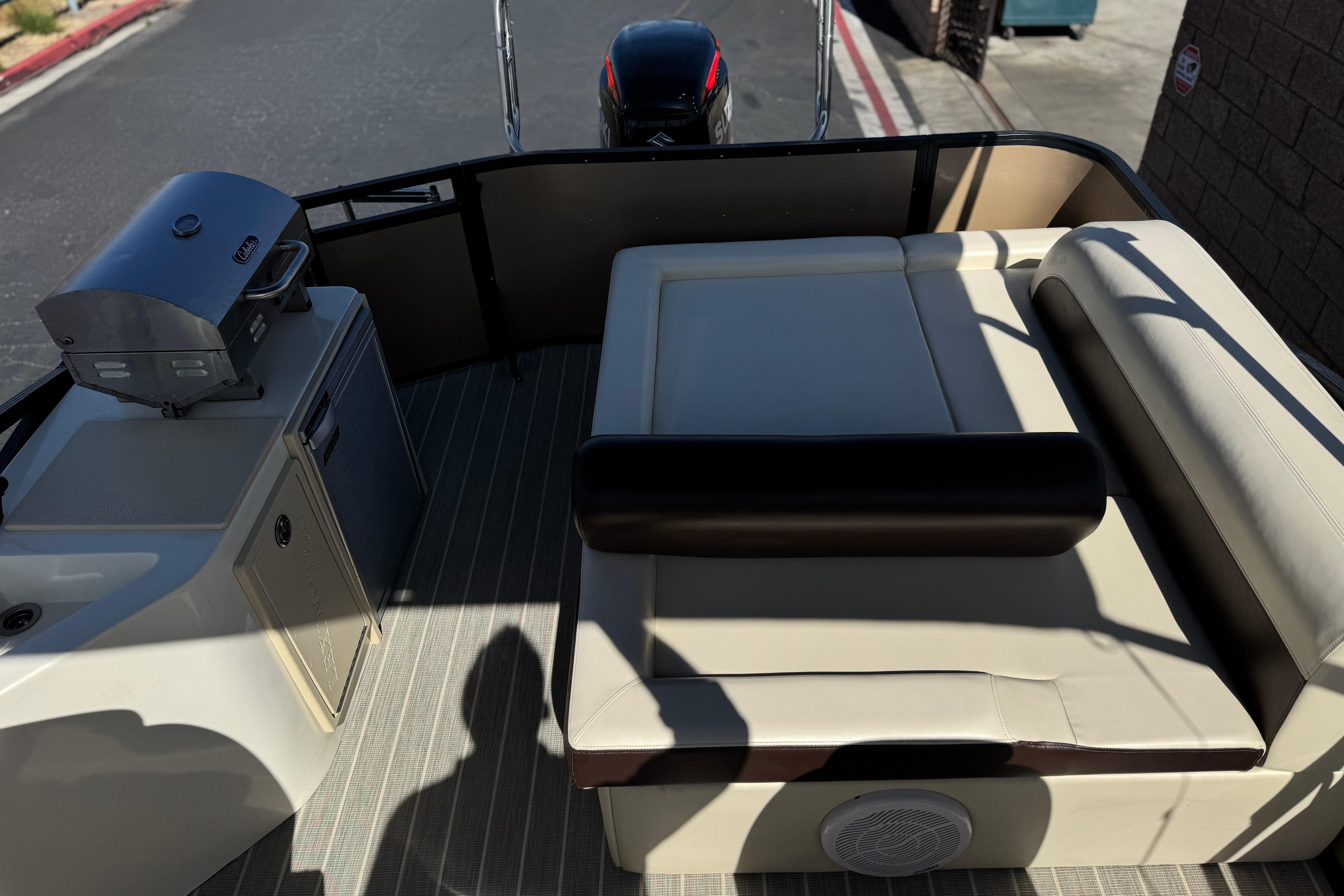 2023 Lexington 623 ST Xtreme boat interior with seating and grill on deck.