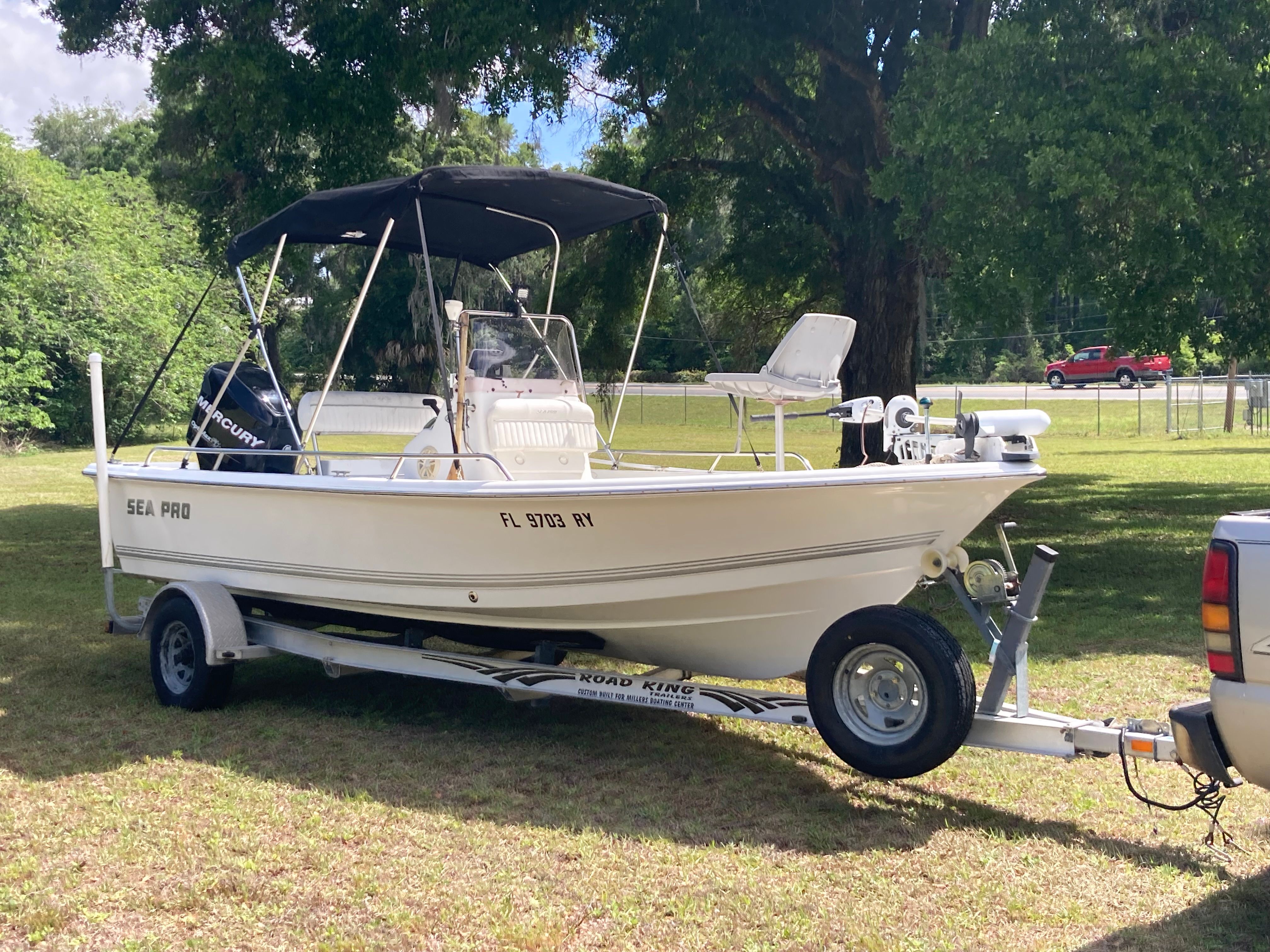 2007 Seapro SV1900CC boat on trailer parked outdoors.