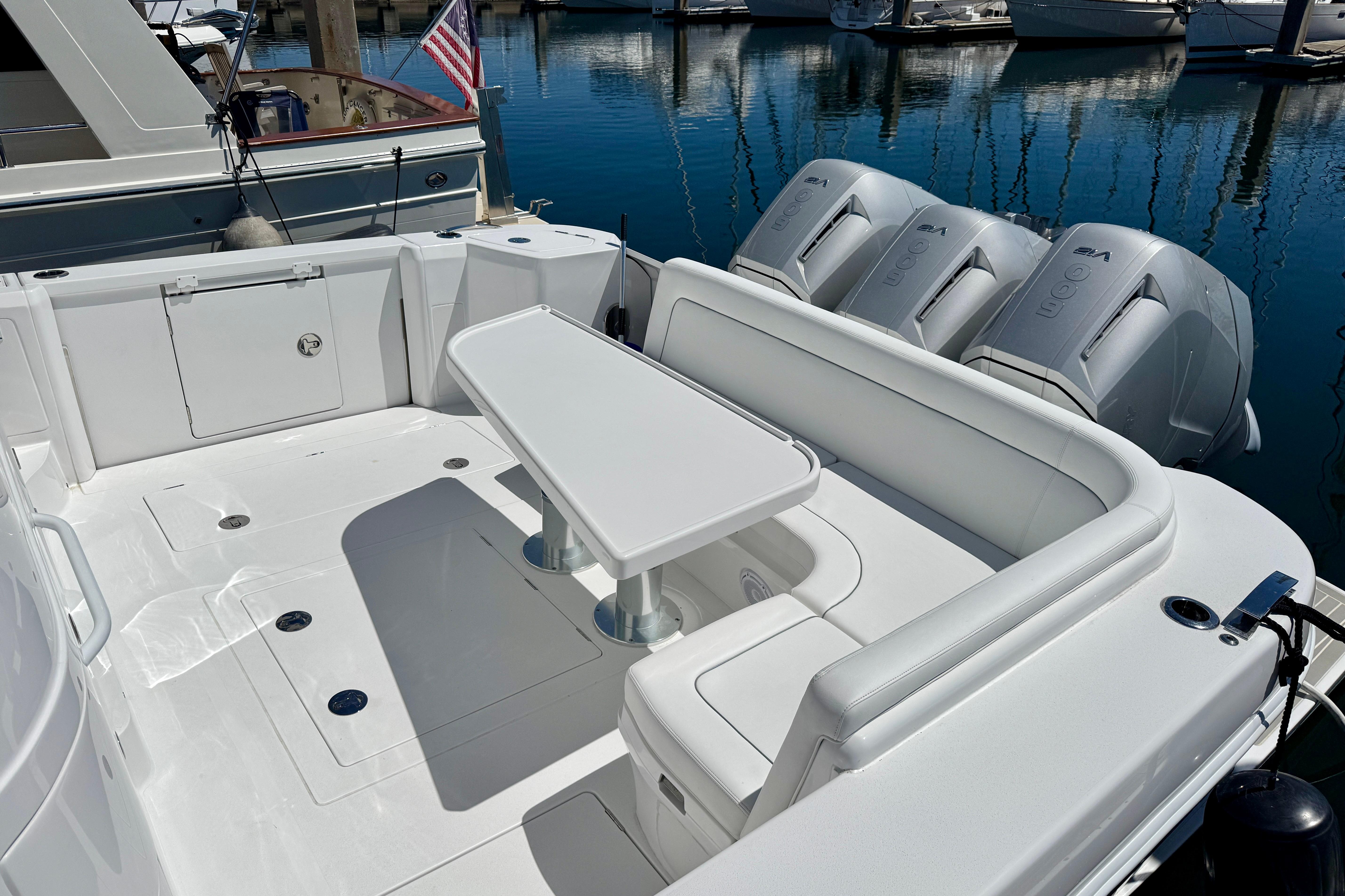 Luxurious 2025 Intrepid 50 Evolution yacht with spacious seating and powerful engines.