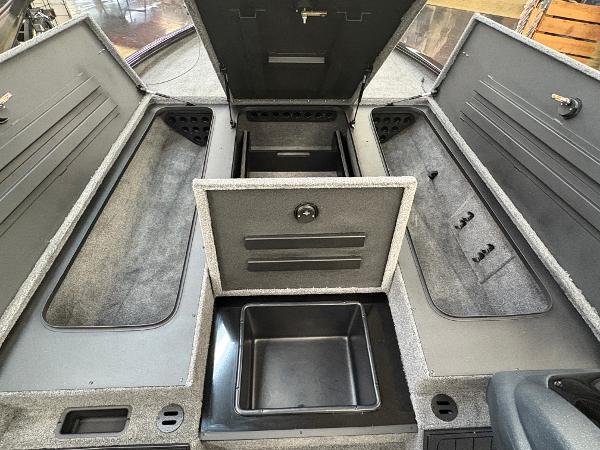 2025 Tracker Savage 215 boat storage compartments, open and spacious interior view.