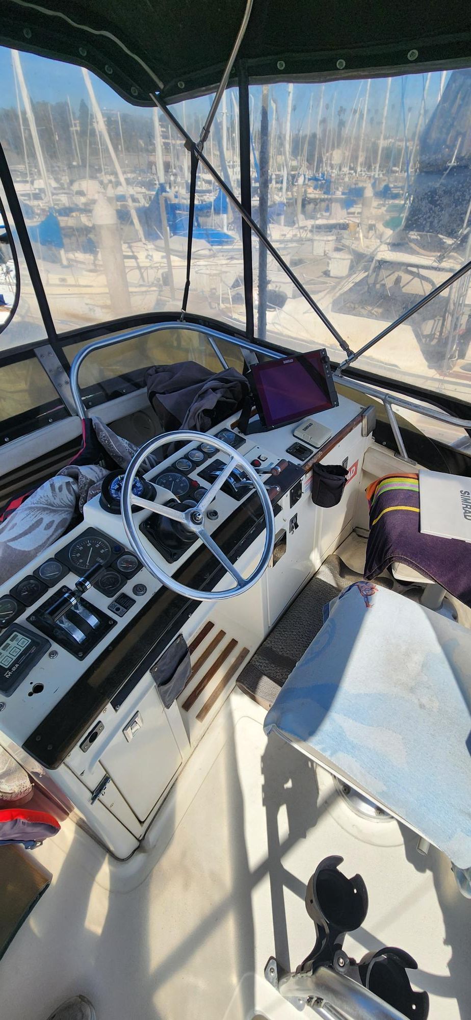 Interior view of a 1990 Luhrs 320 boat in harbor.