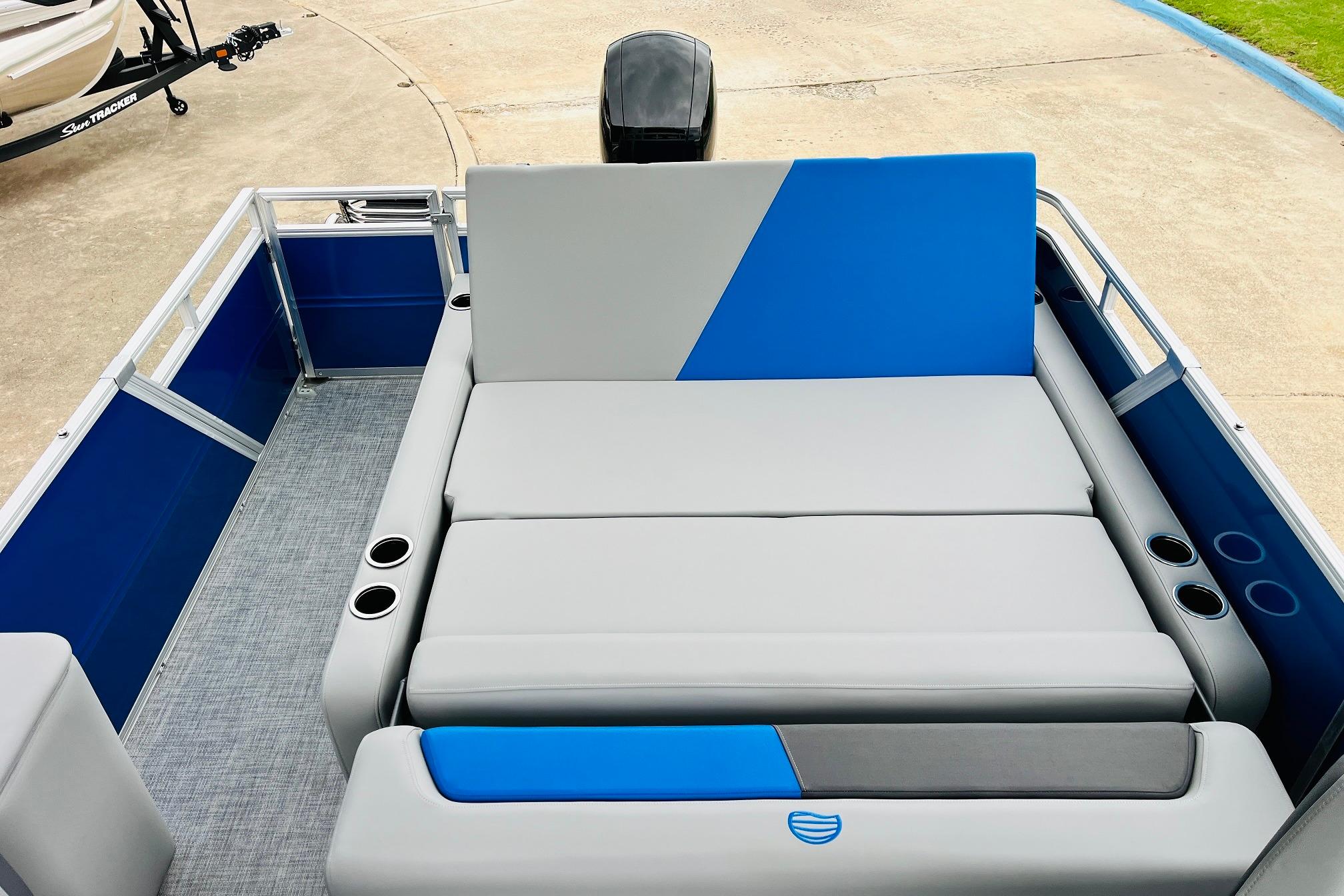 2026 Sun Tracker Party Barge 22 RF DLX with spacious seating and cup holders.