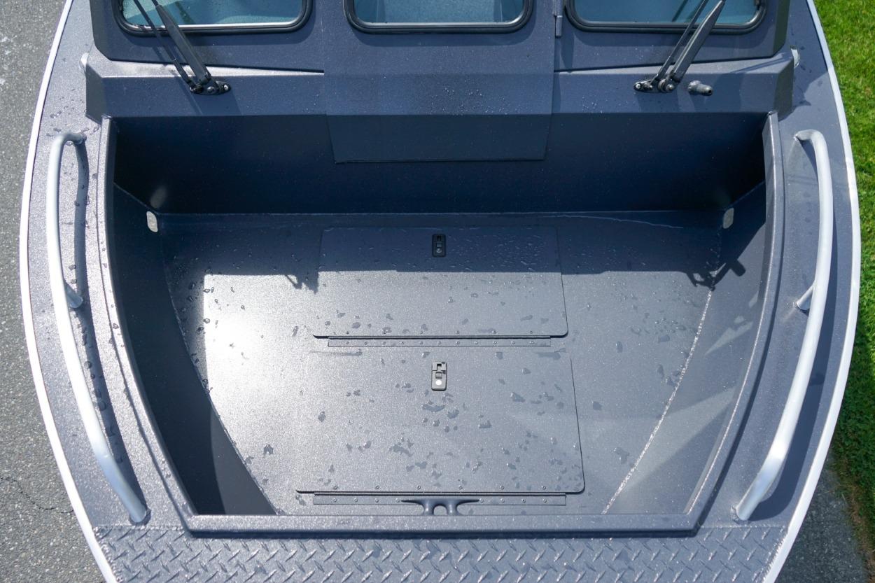 2026 Alumaweld X202 Stryker boat interior, featuring spacious deck and storage compartments.