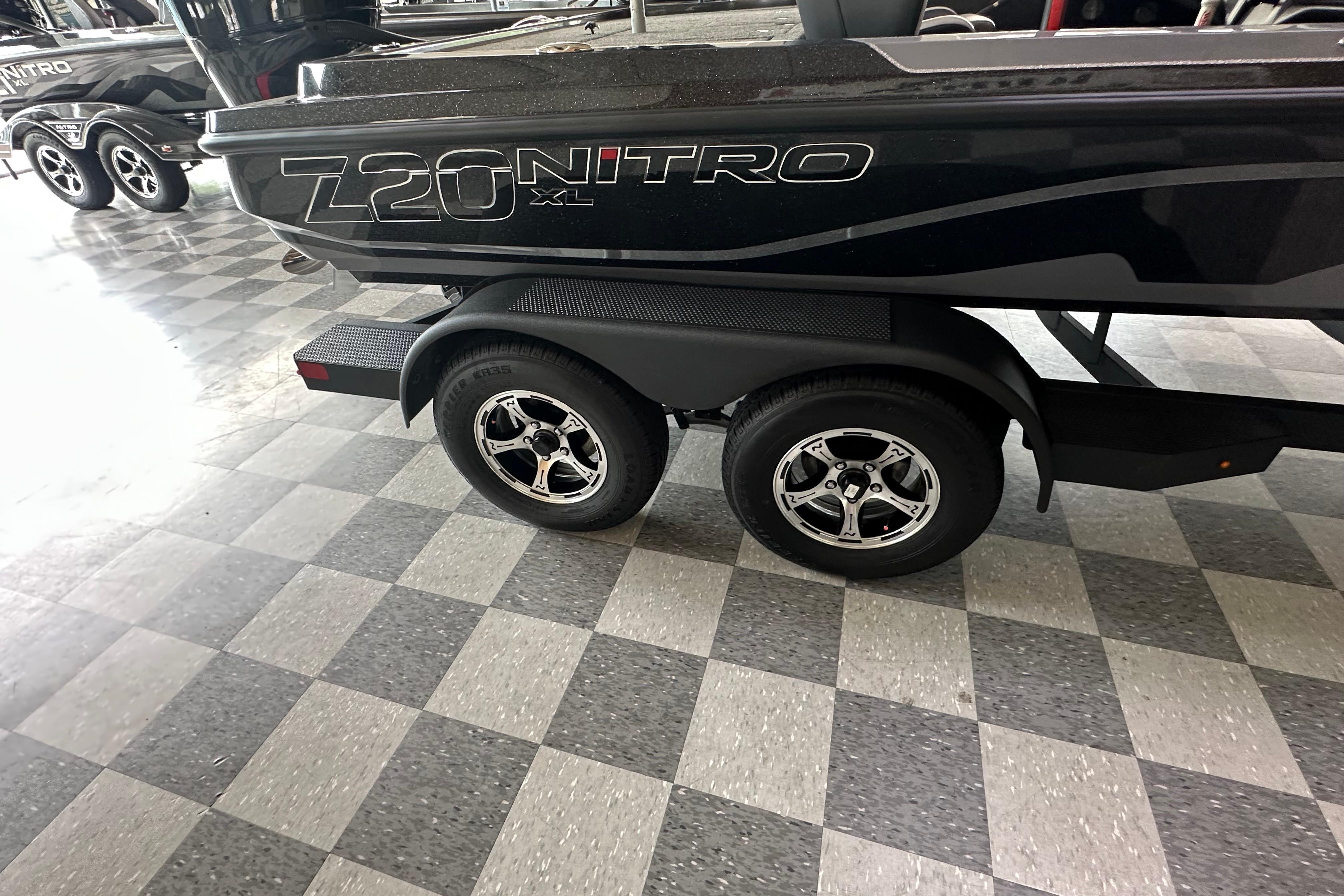2025 Nitro Z20 XL Pro boat trailer with sleek design and shiny wheels.