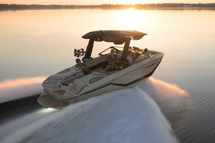 Manufacturer Provided Image: 2026 Nautique Super Air Nautique G23 cruising on a serene lake at sunset.