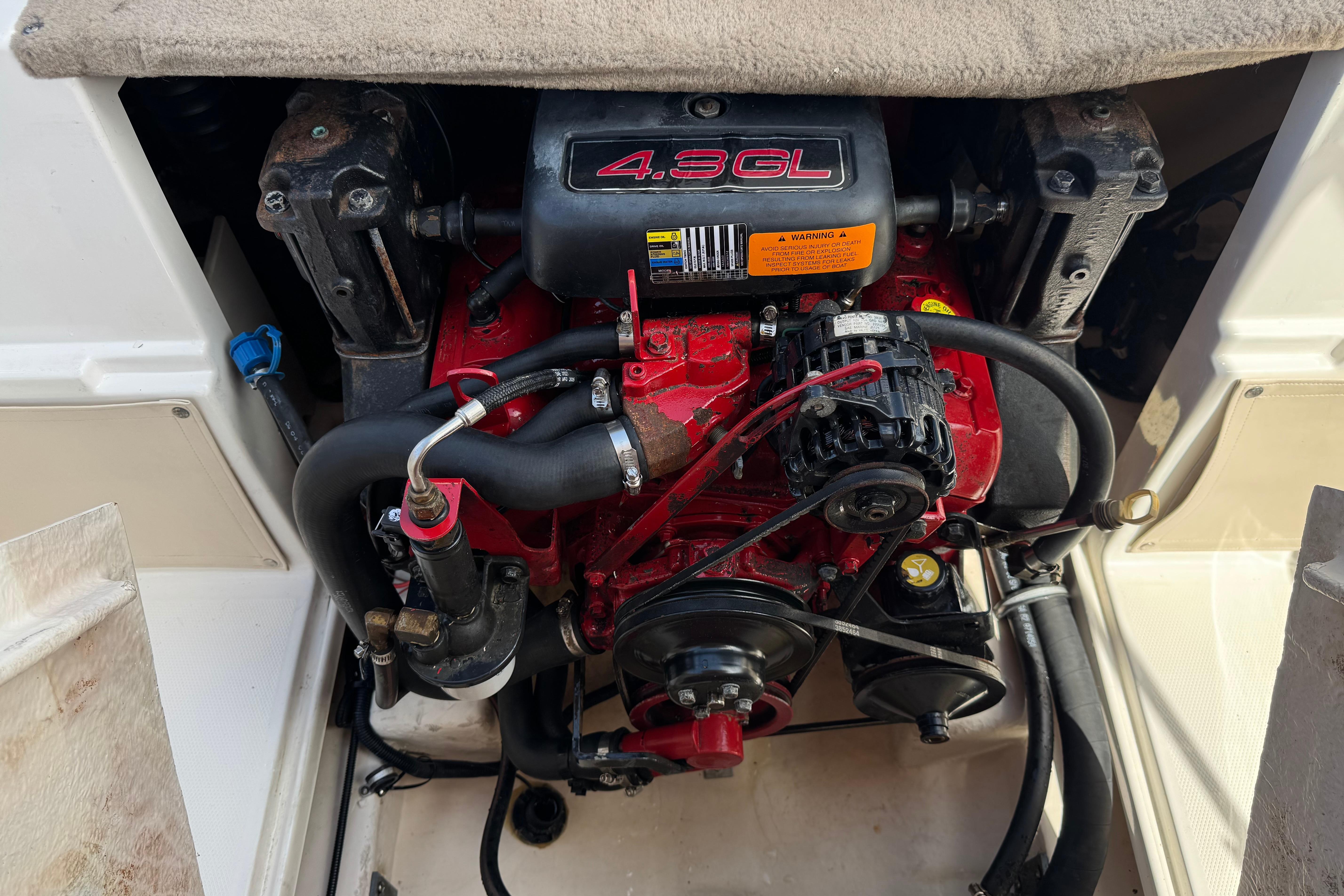 Engine compartment of a 2006 Chaparral 190 SSi boat, featuring a 4.3GL engine.