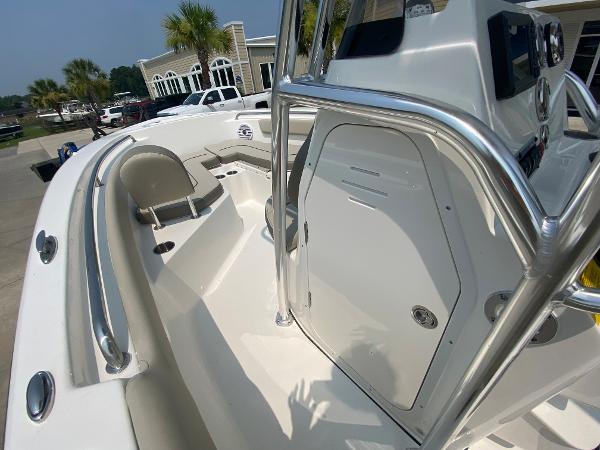 2024 Key West 203 FS boat interior with seating and console.