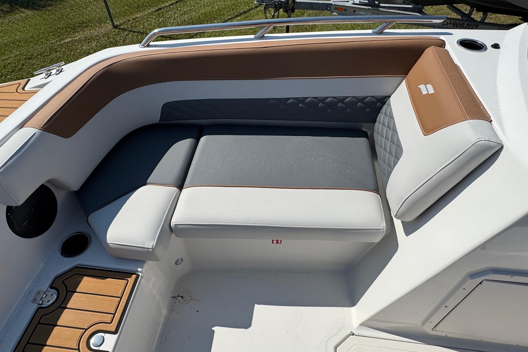 Luxurious seating on 2026 Starcraft SVX 190 OB boat, featuring elegant upholstery and modern design.