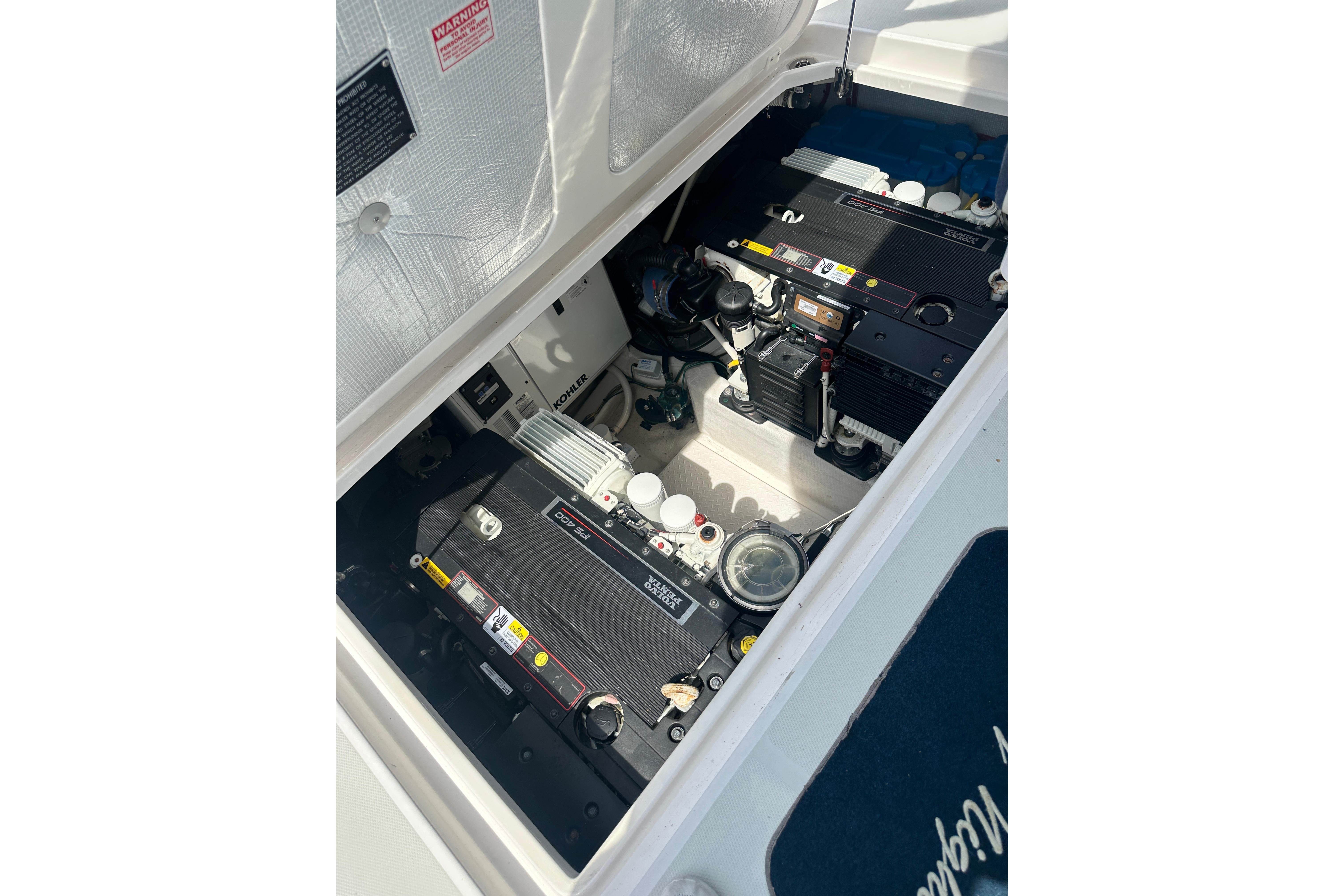 Engine compartment of 2013 Sabre 38 Salon Express yacht, showcasing mechanical components.