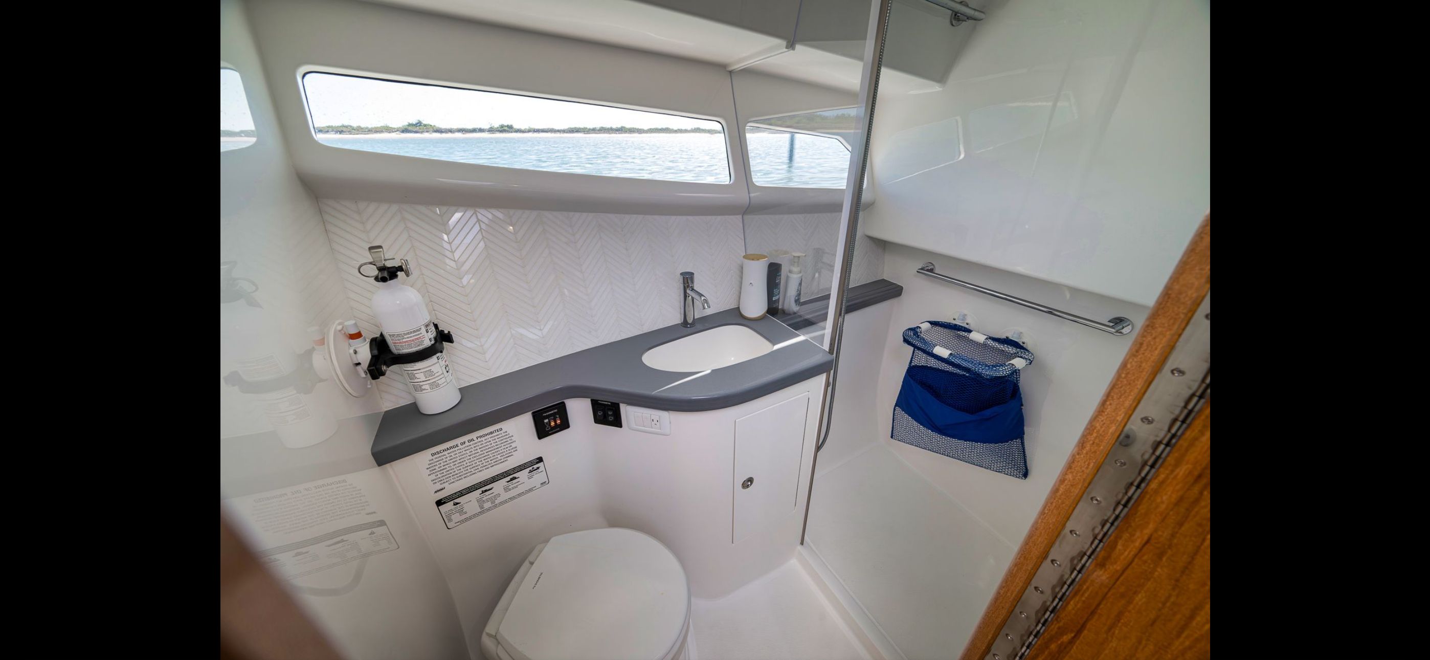 Interior of 2022 Mag Bay 42 Express featuring modern bathroom.