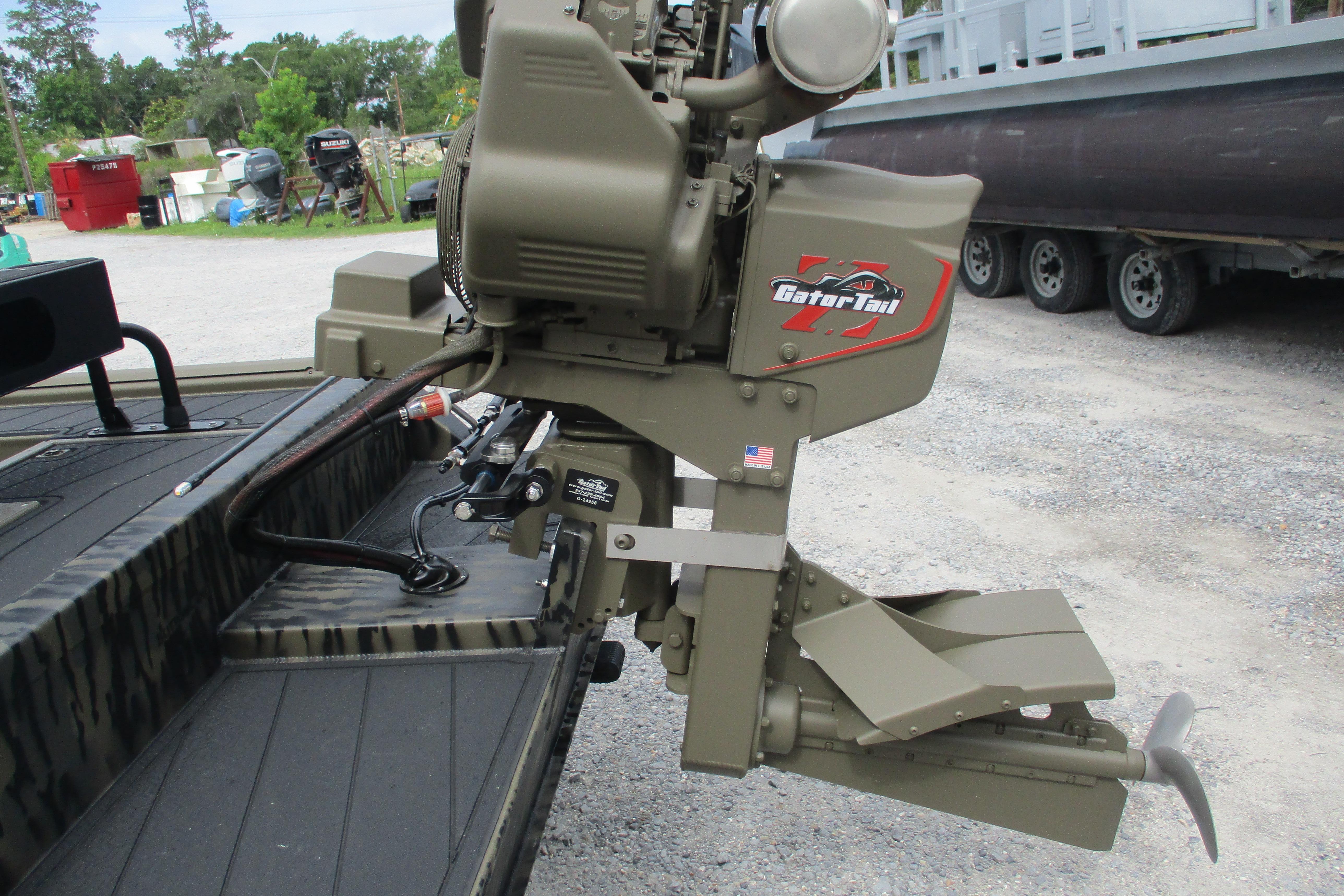 2026 Gator Tail 2060 Extreme CC boat motor, parked outdoors on gravel.