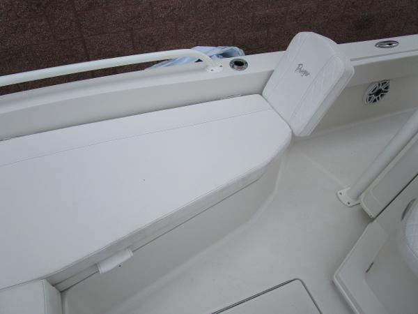 2024 Ranger 2360 Bay boat interior with white seating and storage.