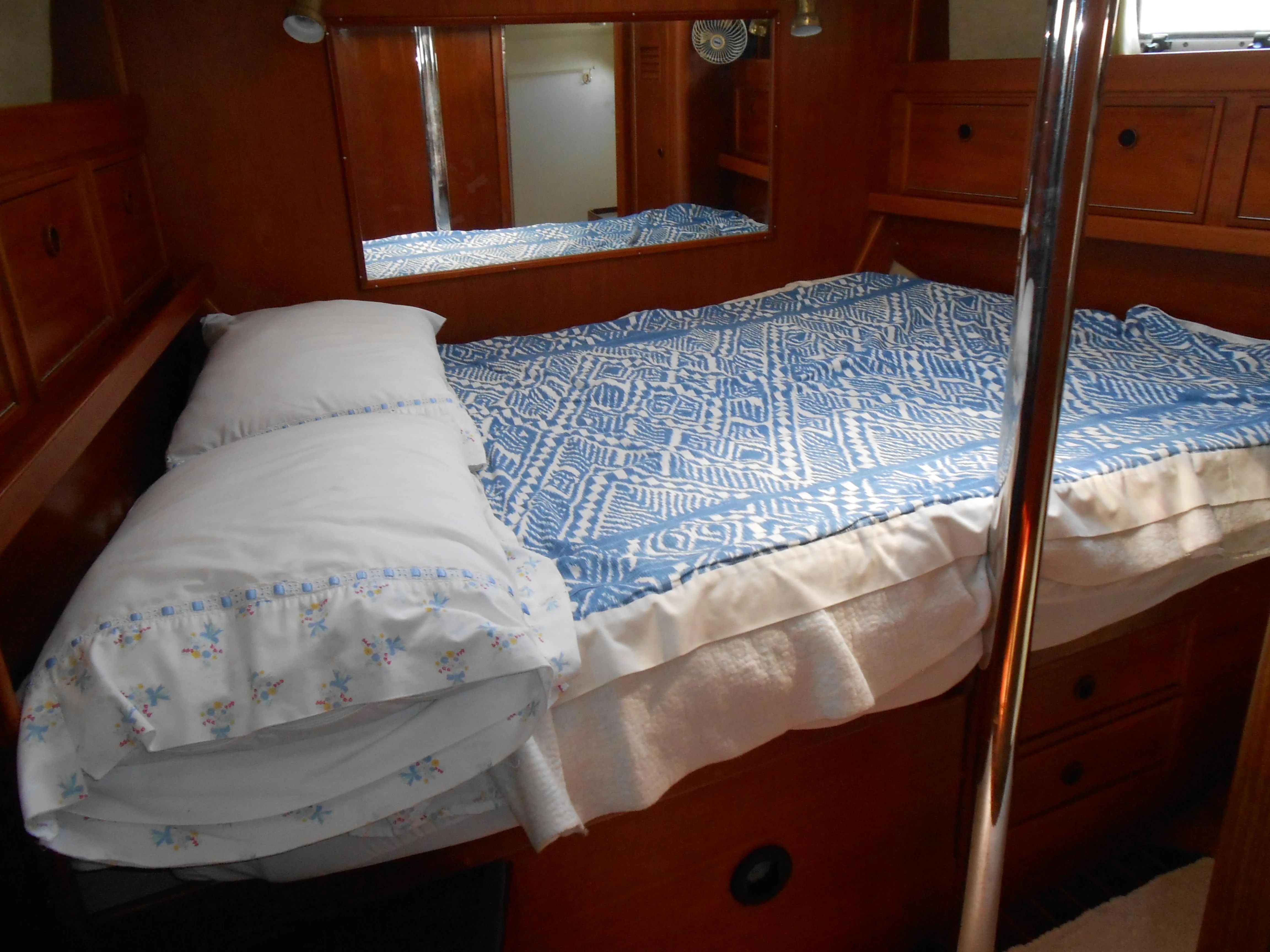 Interior of a 1985 Contest 41 Ketch with cozy bed.