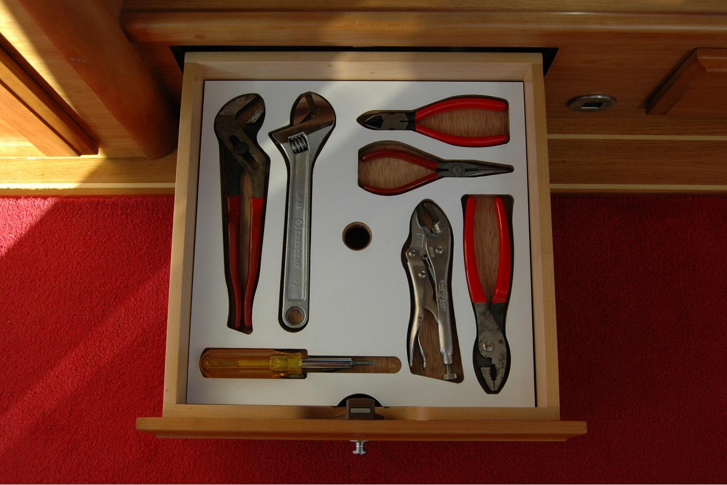Drawer with assorted tools on a 2019 Sabre 38 Salon Express boat.