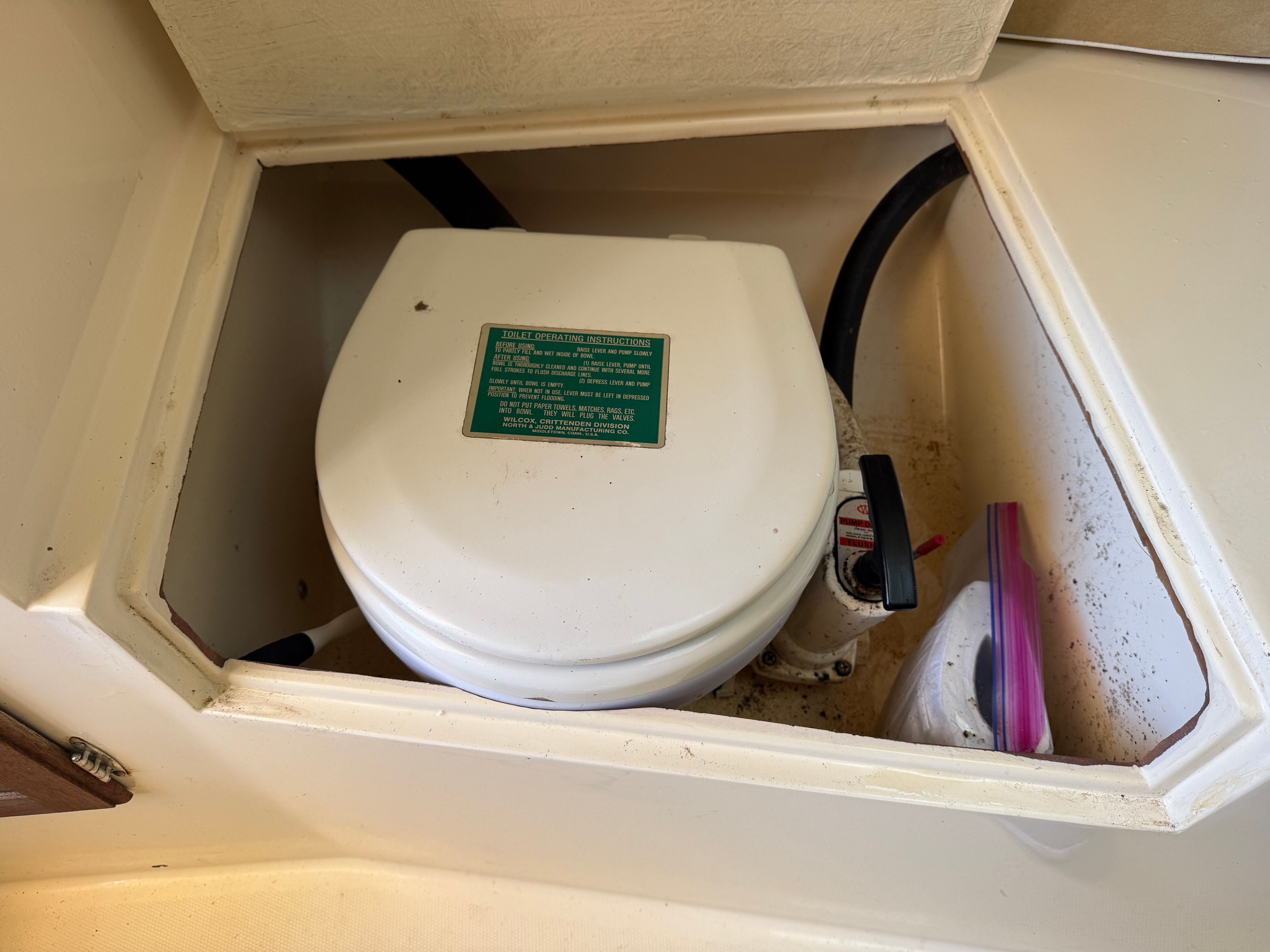 A boat toilet in a 1989 Fortier 26.