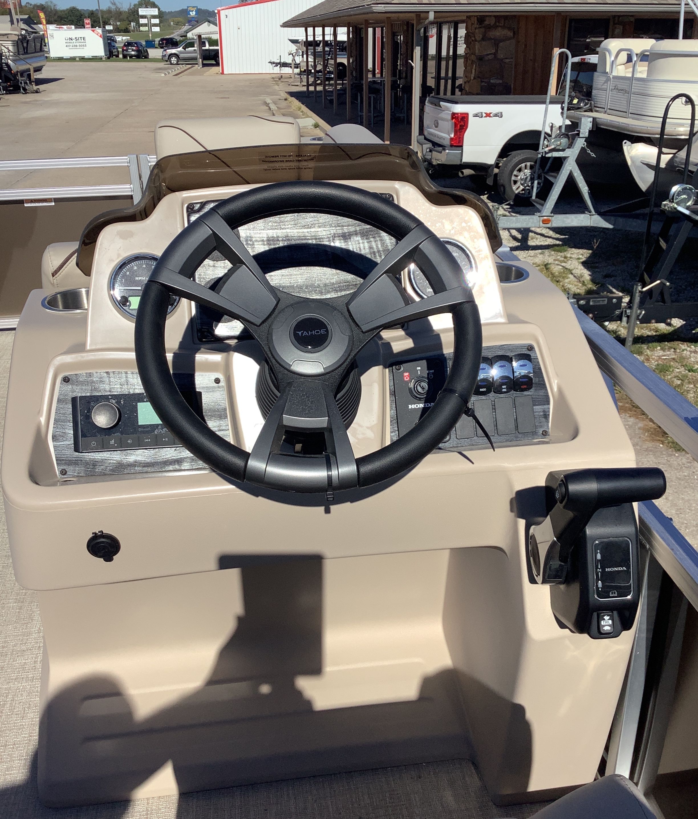 Steering console of the 2026 Tahoe 1980 Sport Cruise boat.