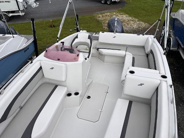 2024 Starcraft 171 SVX boat interior with seating and steering console.
