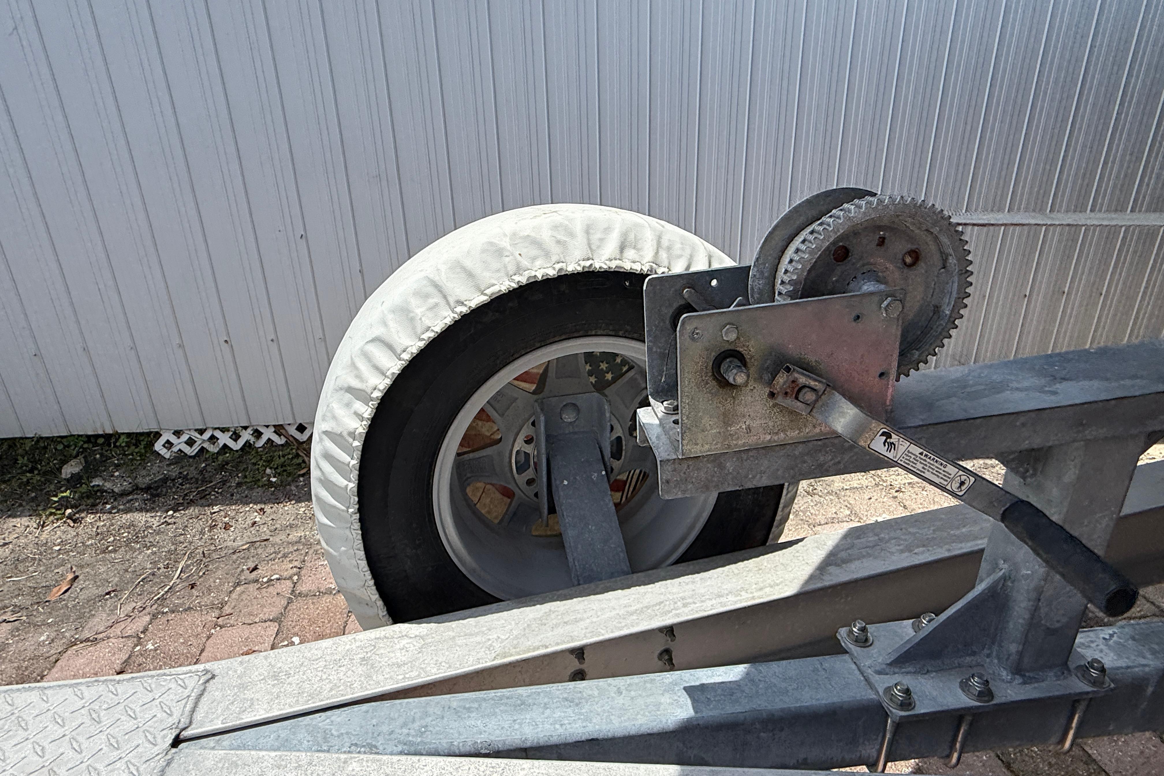 Trailer wheel with cover and winch mechanism, Blackwood 27, 2015 model.