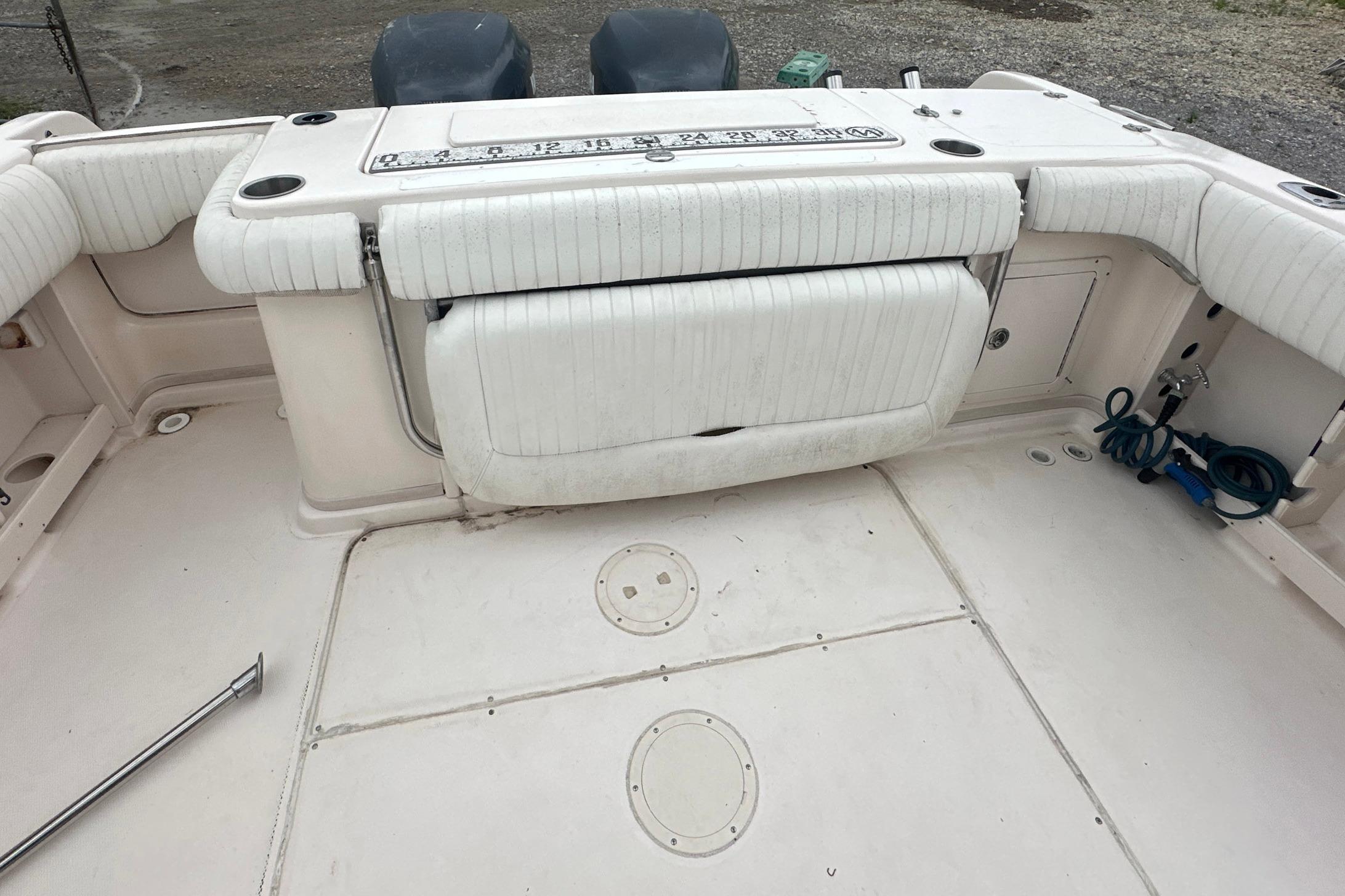2006 Grady-White Marlin 300 boat interior with white seating and deck layout.