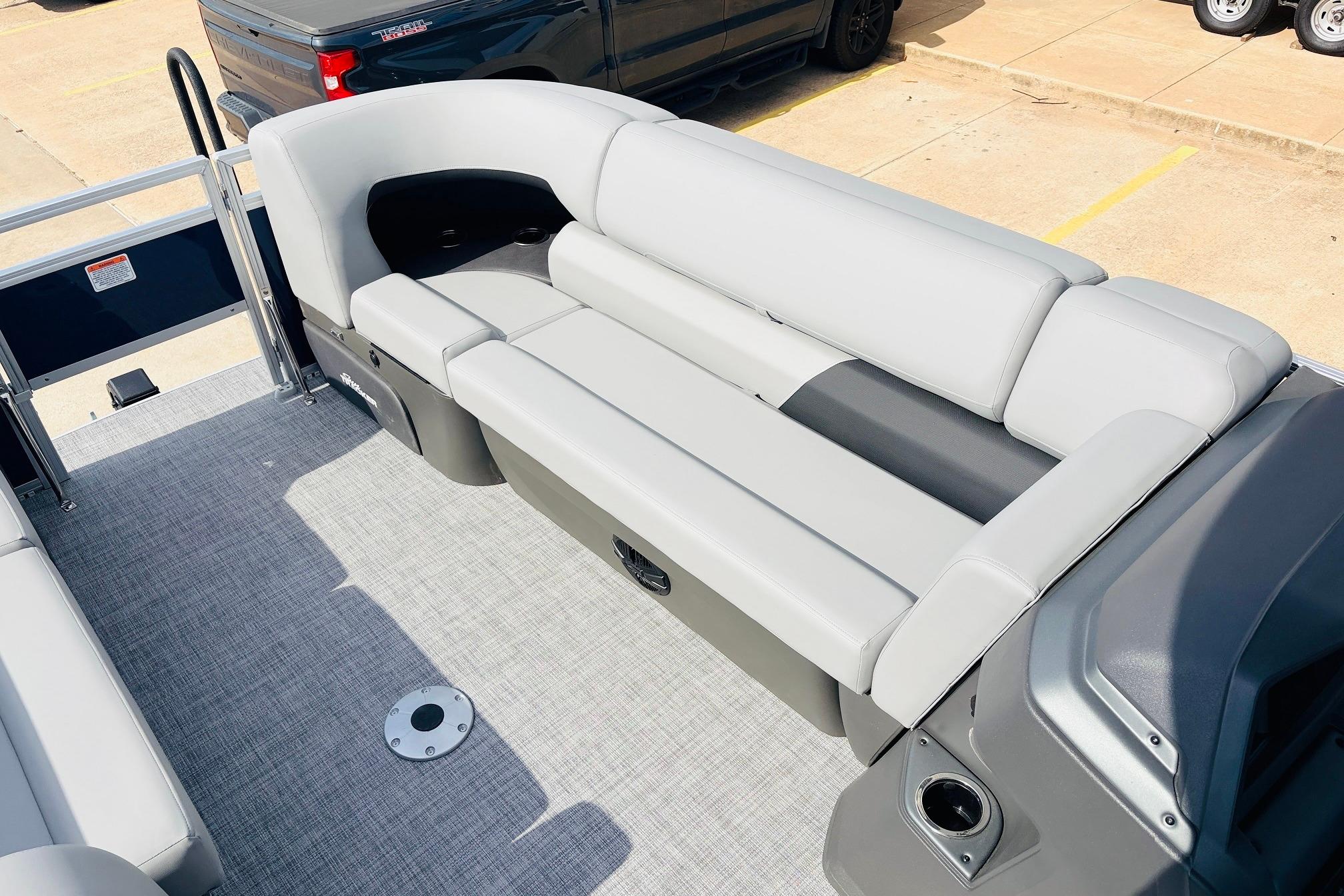 2026 Sun Tracker SportFish 22 DLX pontoon boat with spacious seating and modern design.