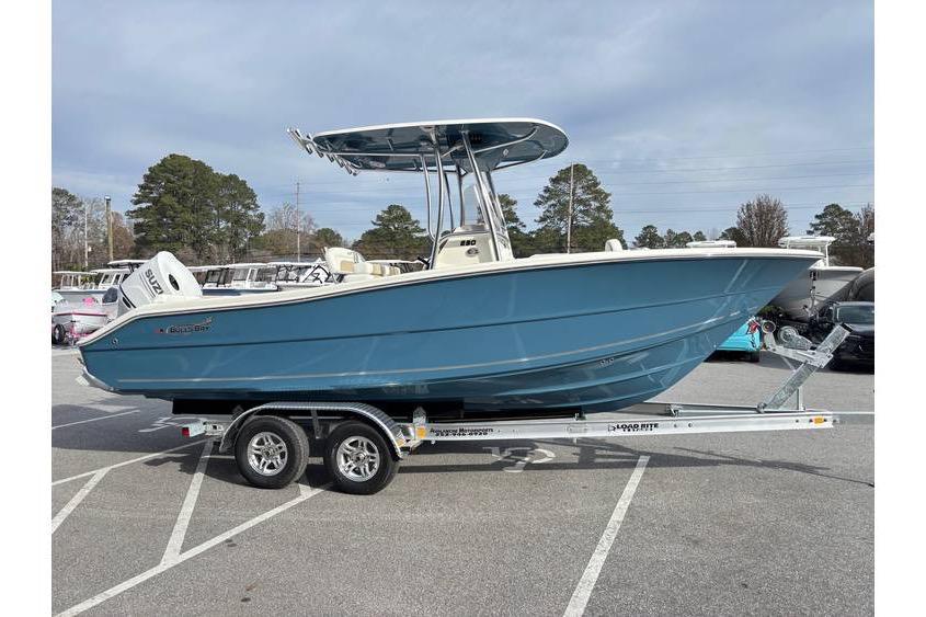 2026 Bulls Bay 230 Center Console boat on trailer in parking lot.