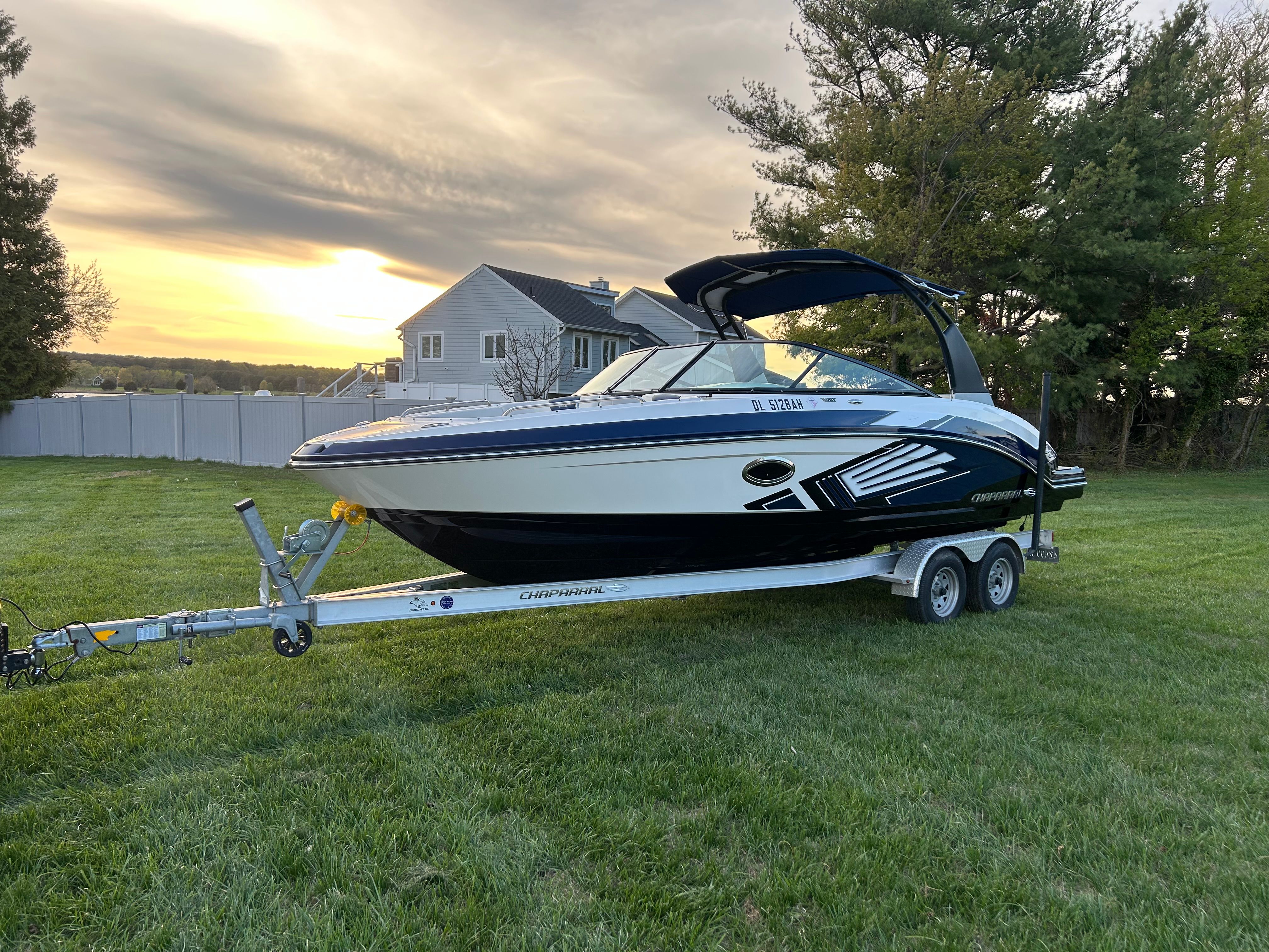 2015 Chaparral Vortex 243 VRX boat on trailer at sunset.