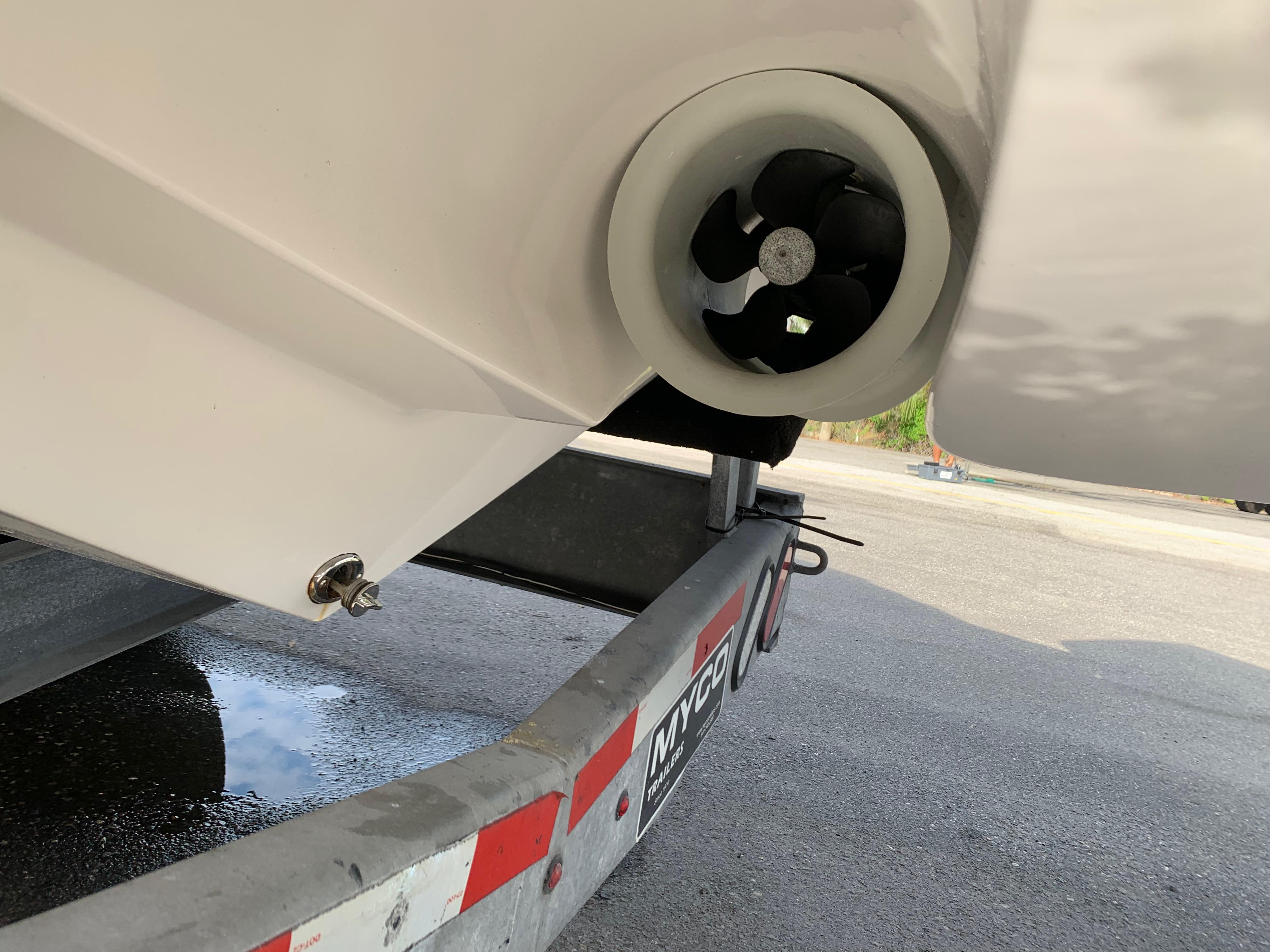 2023 Mystic Powerboats M3800 on trailer, showcasing propeller detail.