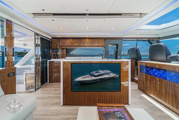 Luxurious interior of 2025 Riviera 645 SUV yacht with modern amenities and panoramic views.